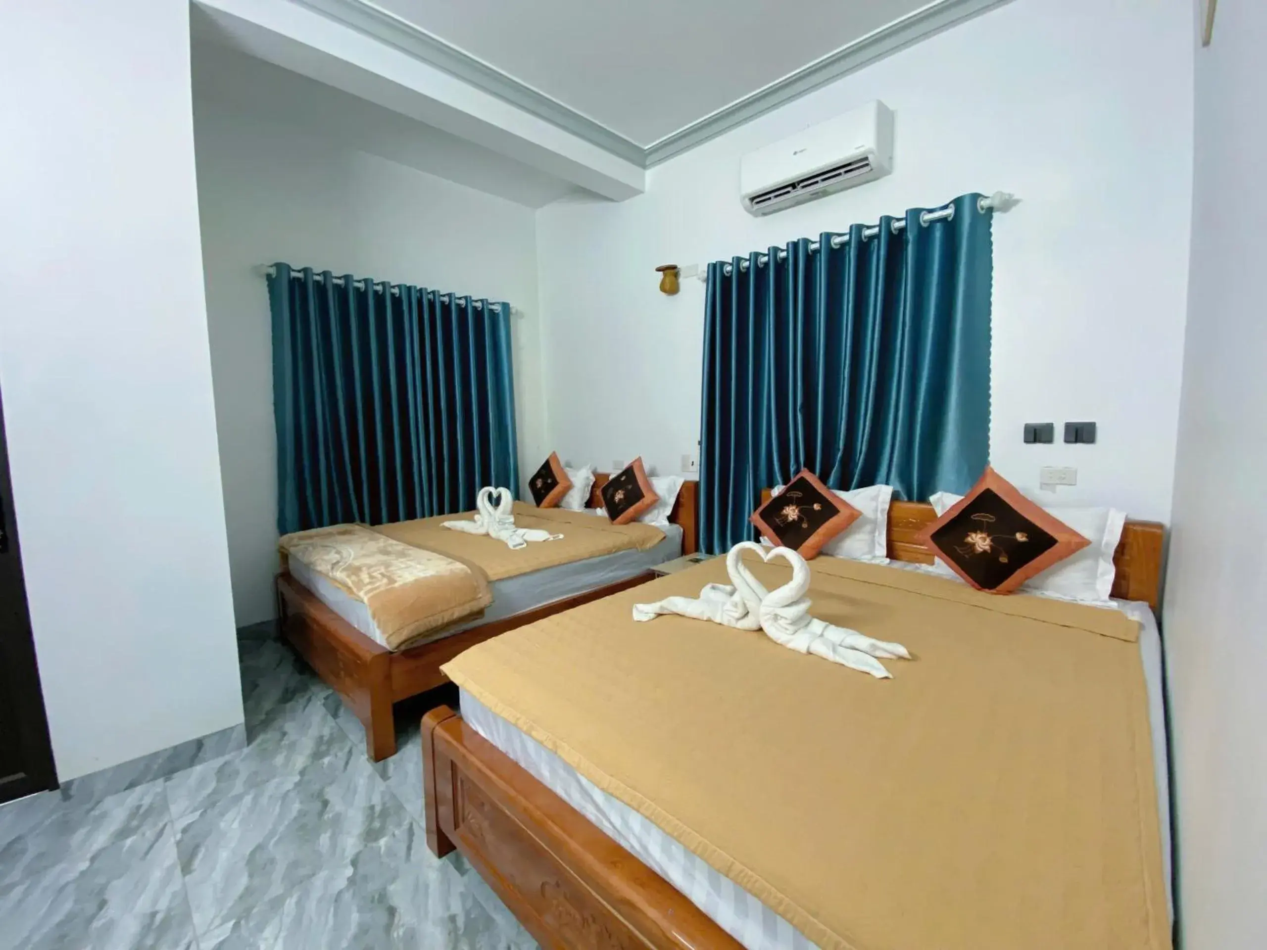 Quadruple Room with Private Bathroom in Tam Coc White Swan Homestay Quadruple Room with Private Bathroom in Tam Coc White Swan Homestay