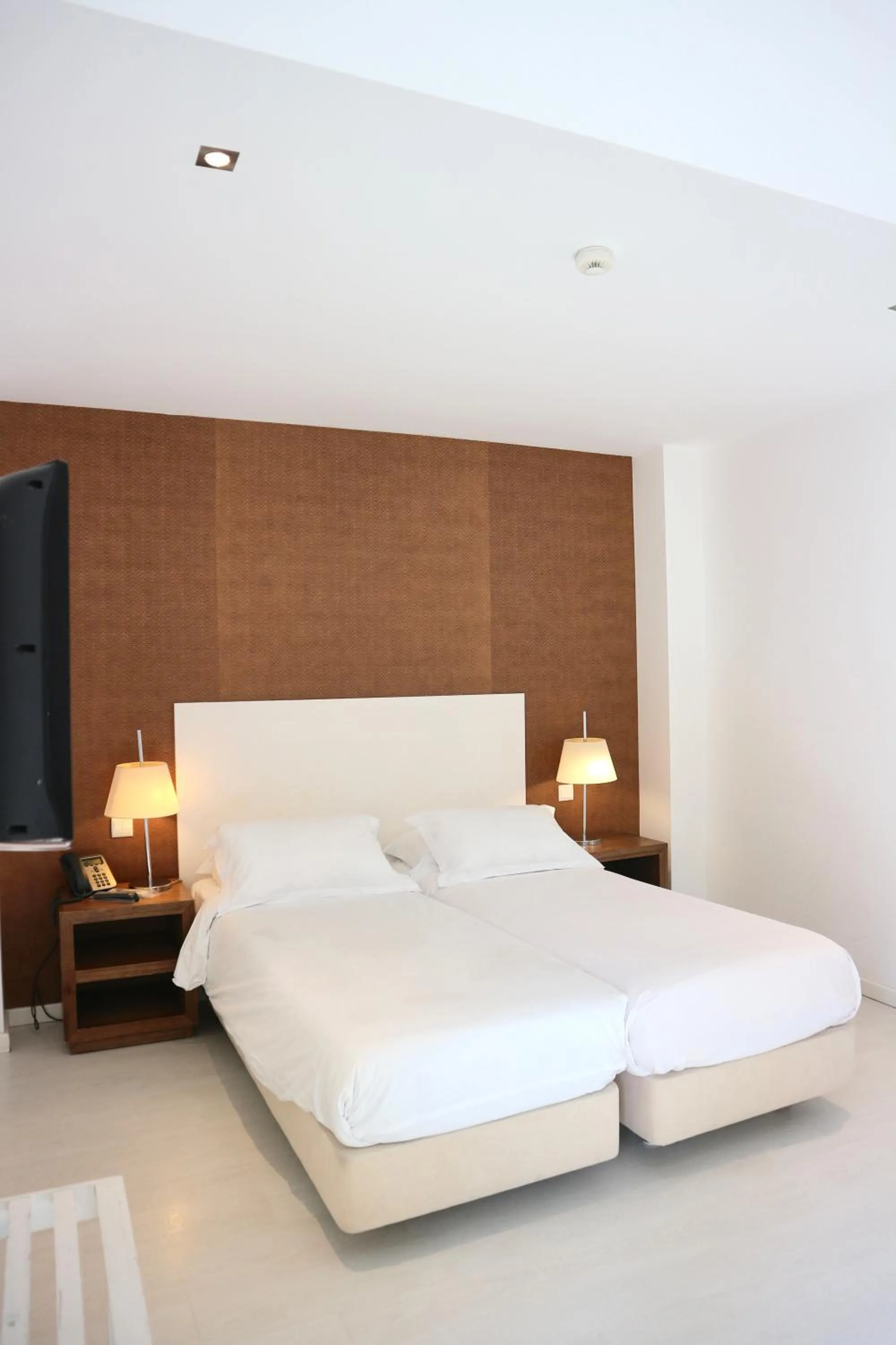 Bed in Amazonia Estoril Hotel