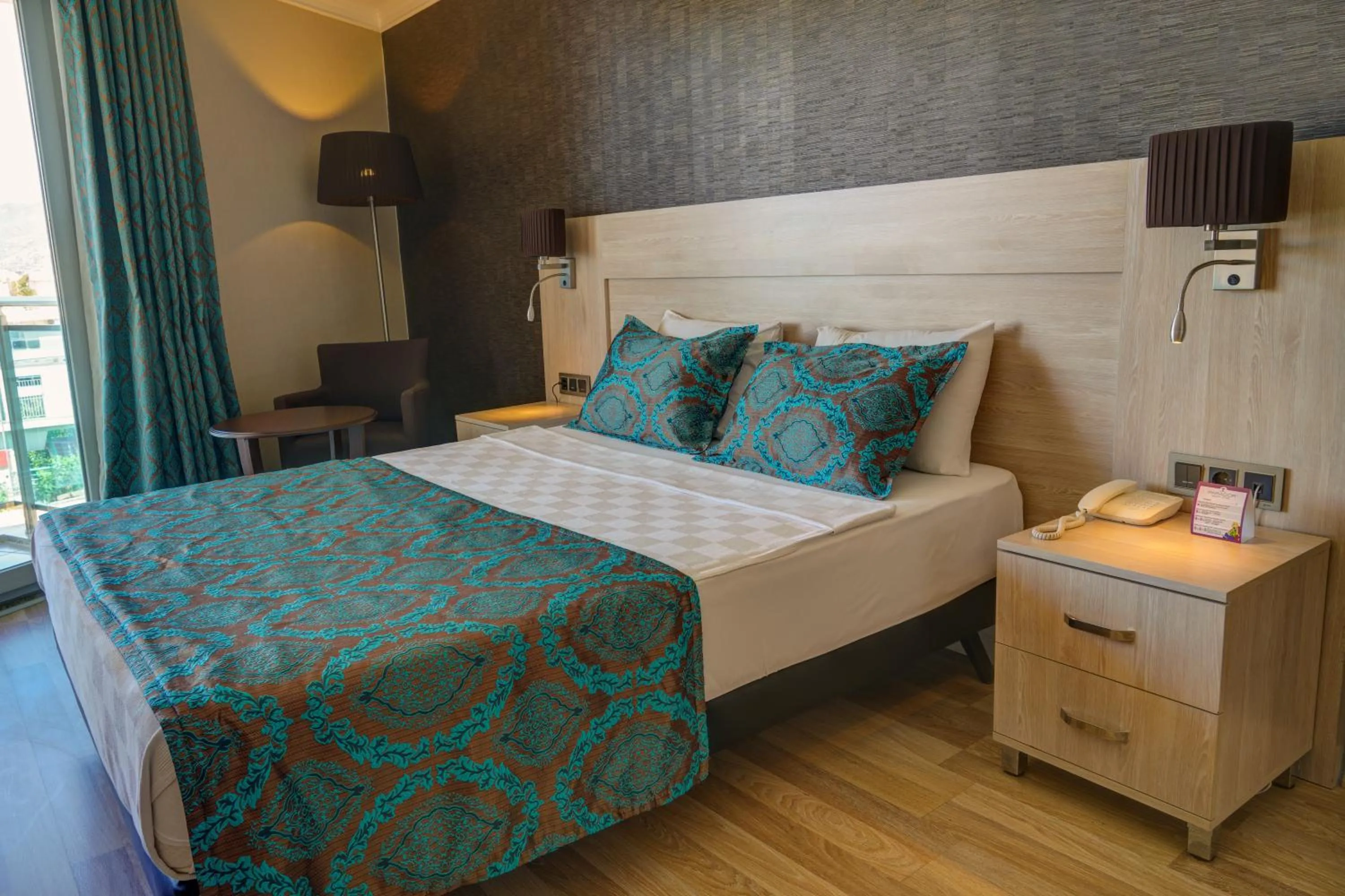 Bed in Parador Beach Hotel All Inclusive