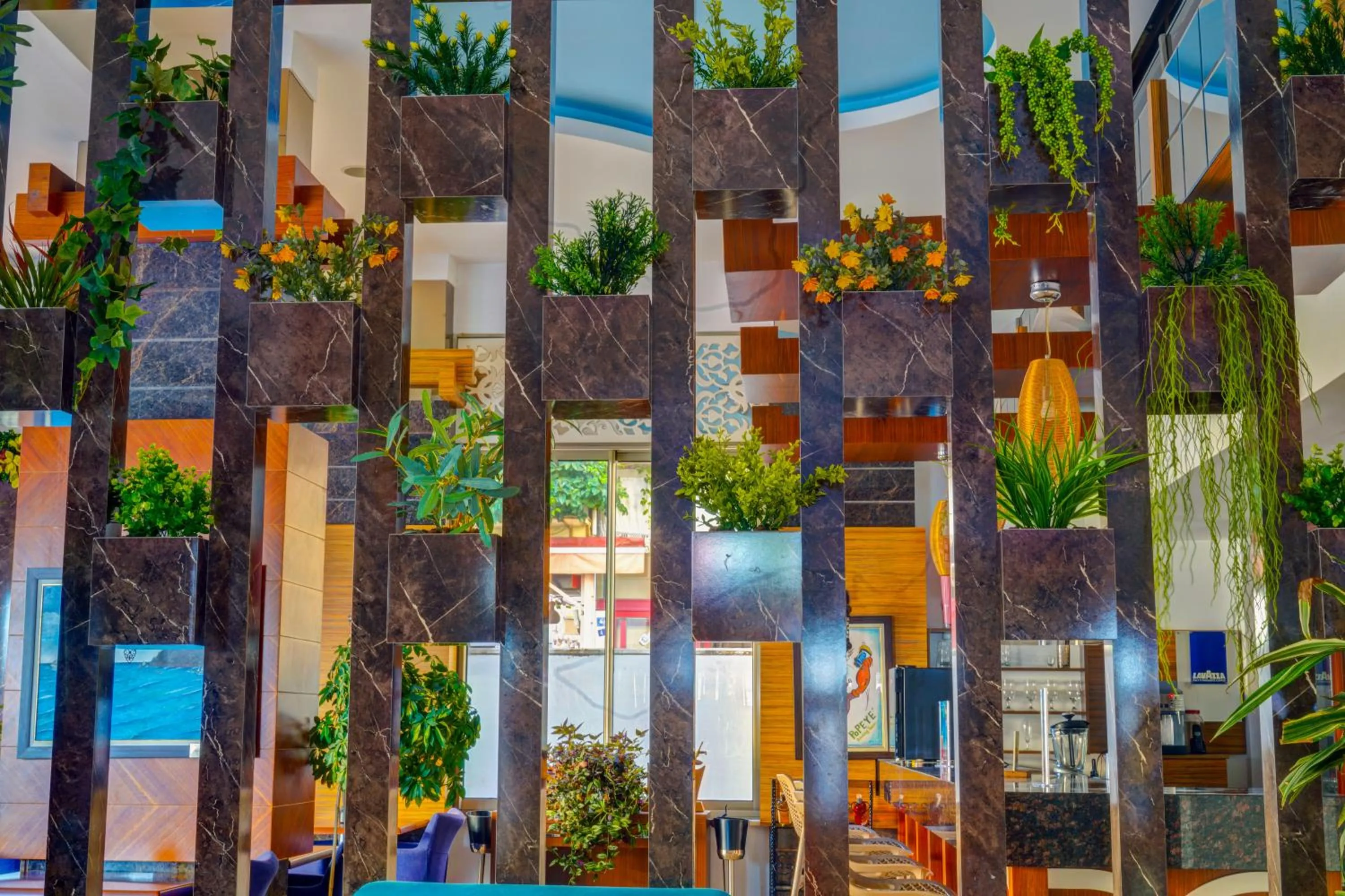 Garden in Parador Beach Hotel All Inclusive