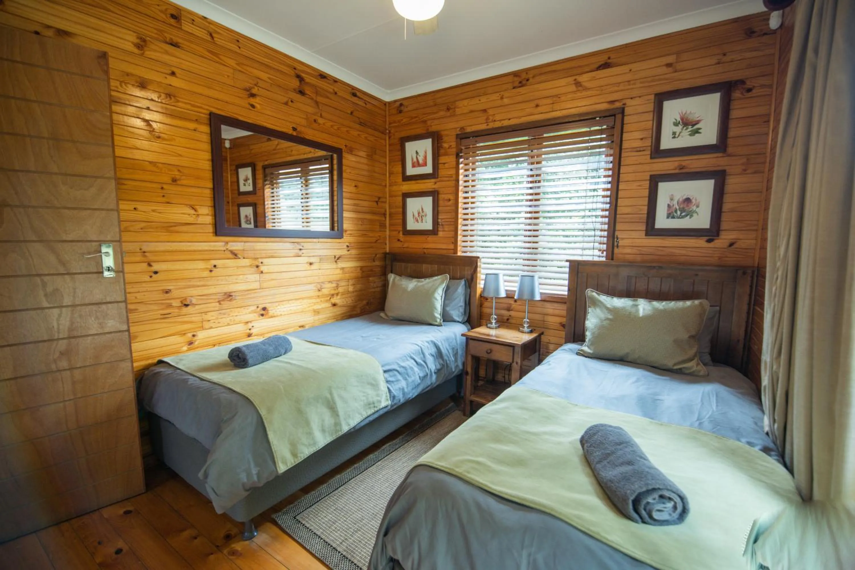 Photo of the whole room, Bed in Thunzi Bush Lodge