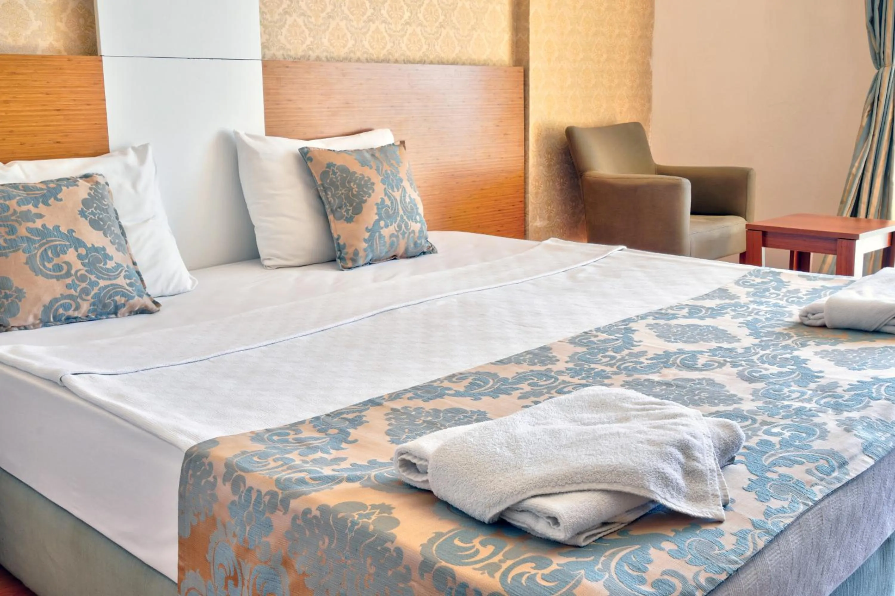 Bed in Blue Fish Hotel All Inclusive