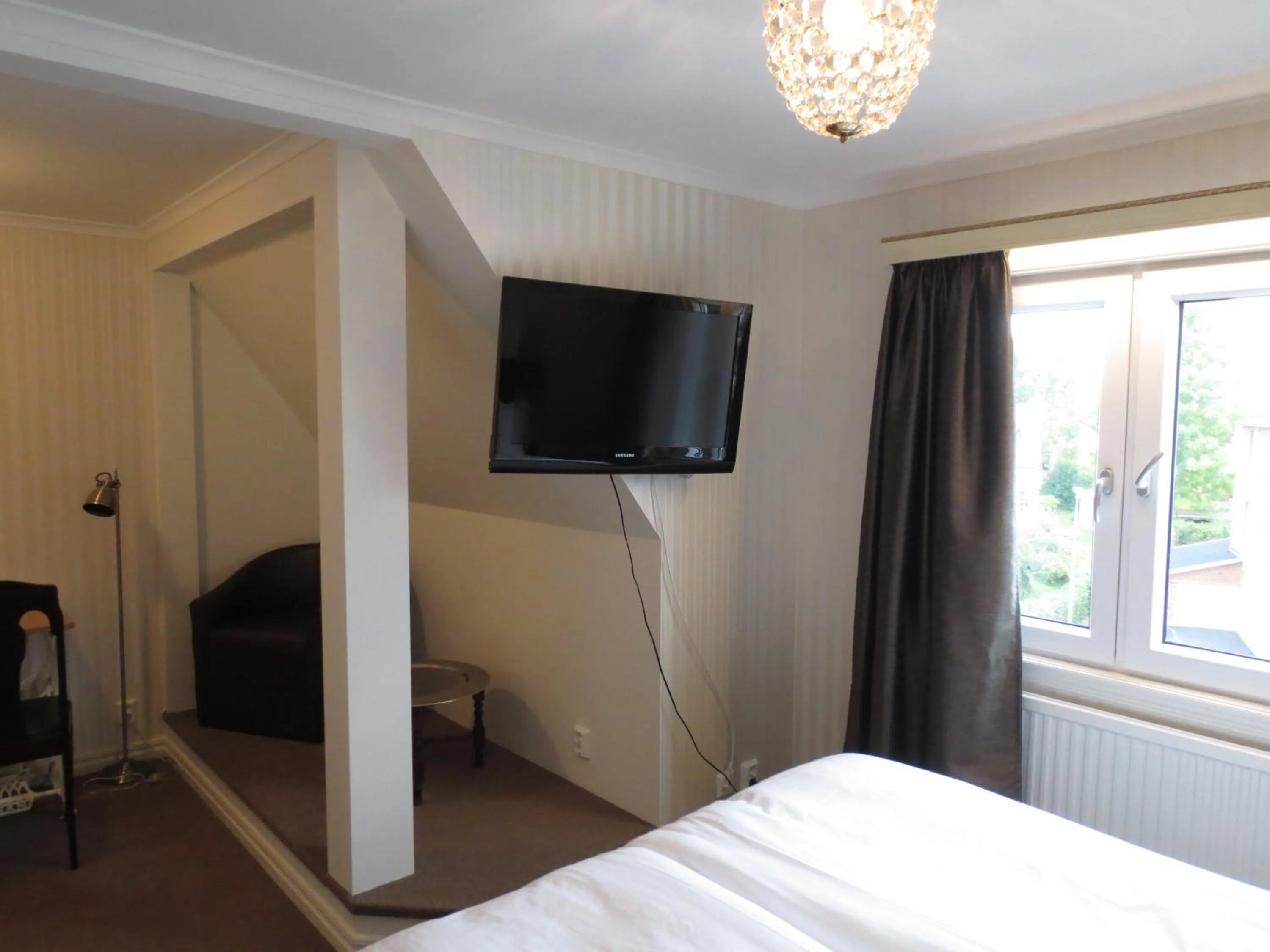 Seating area, Bed in Hotell S:t Olof