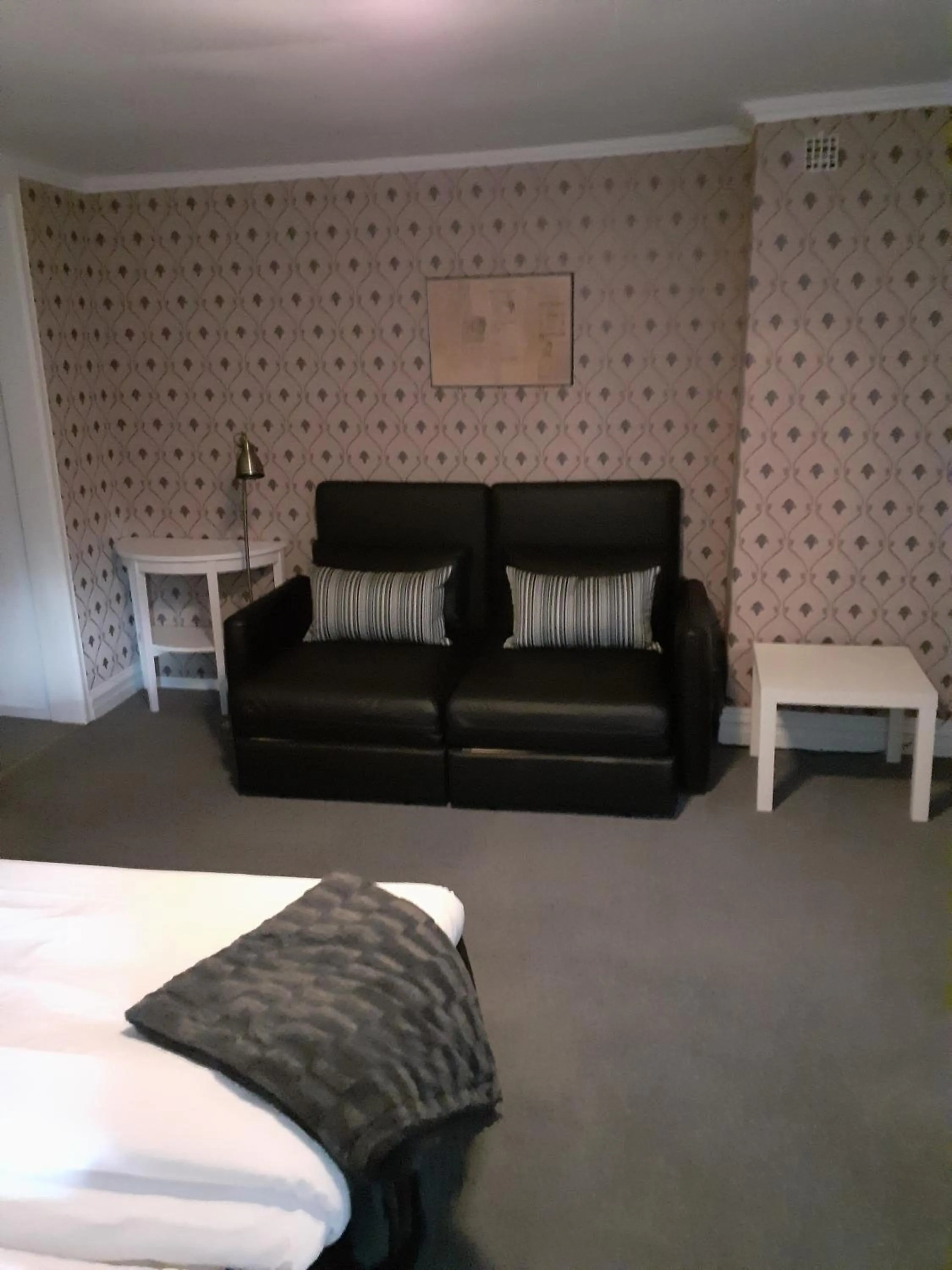 Seating area, Bed in Hotell S:t Olof