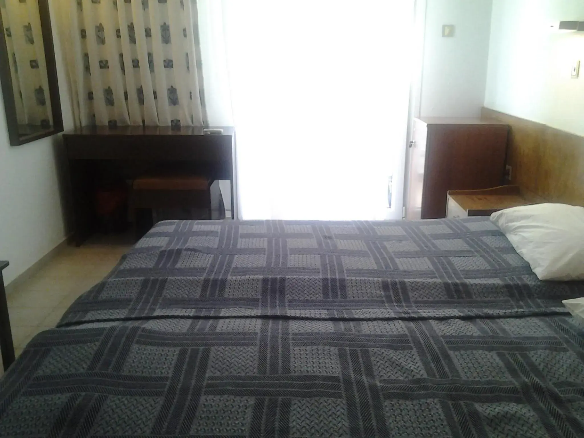 Bed in Oasis Hotel Bed in Oasis Hotel