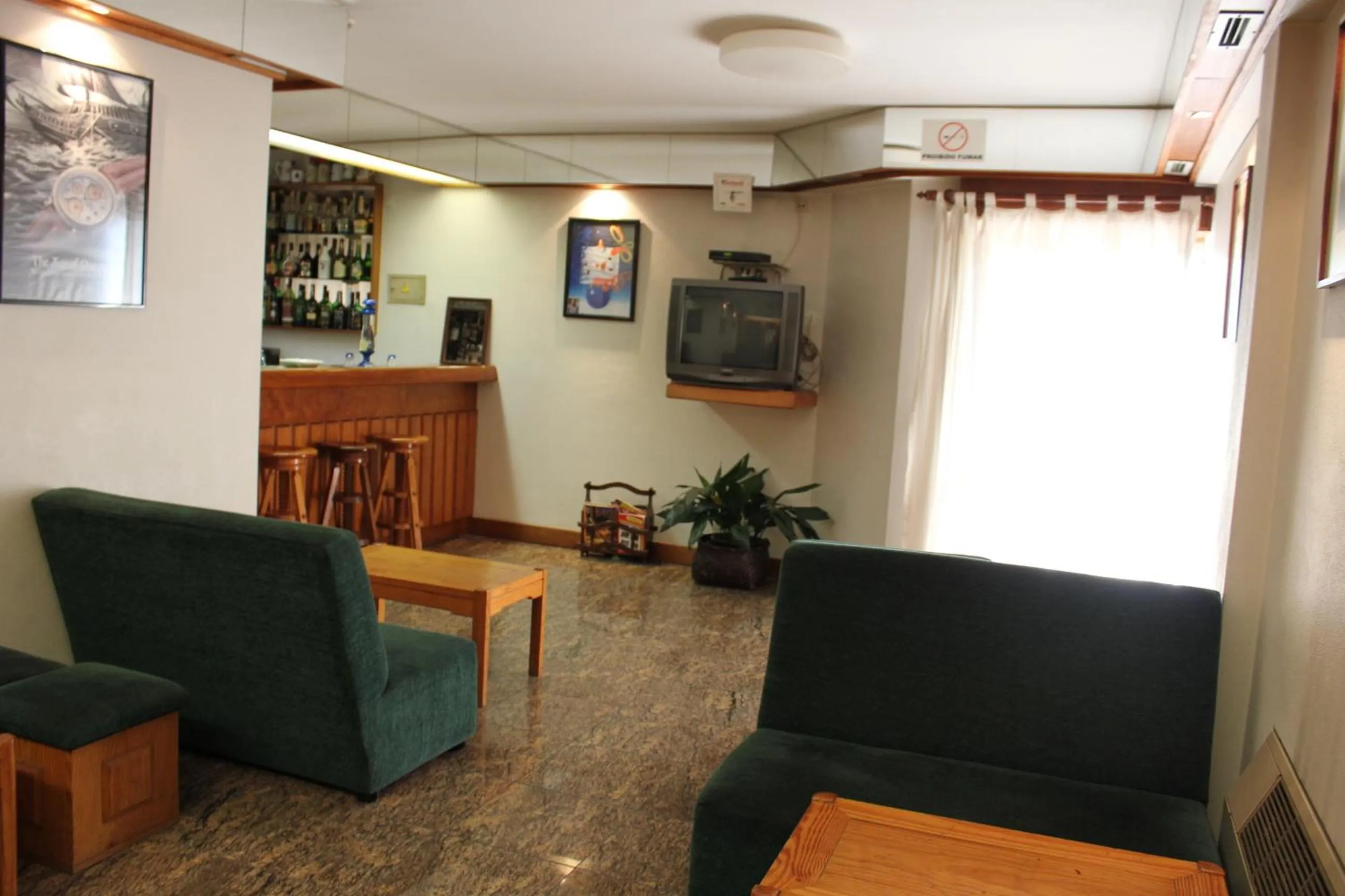 Communal lounge/ TV room in Hotel Bom Sucesso