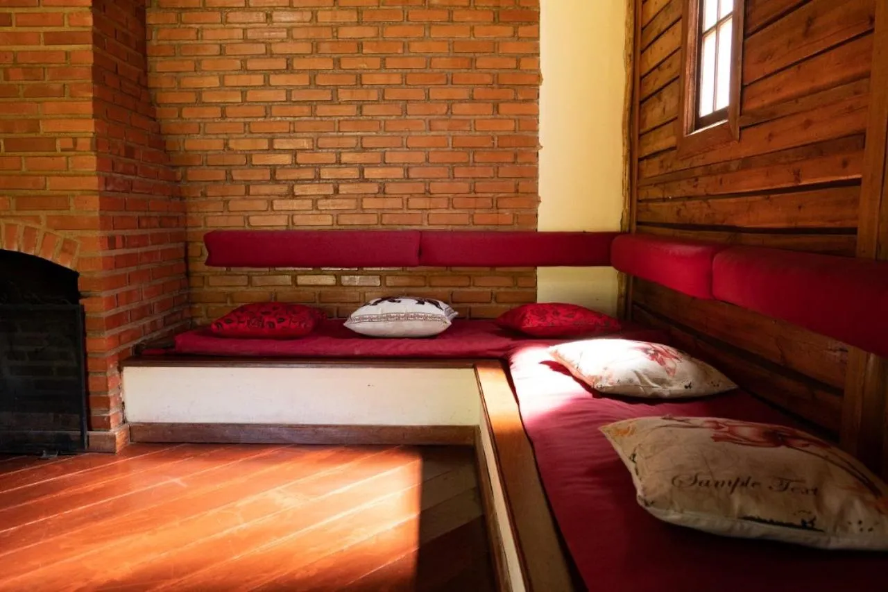 Bed in Pousada Cabanas da Serra Lumiar