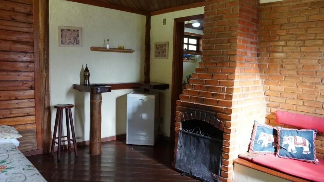 Living room in Pousada Cabanas da Serra Lumiar