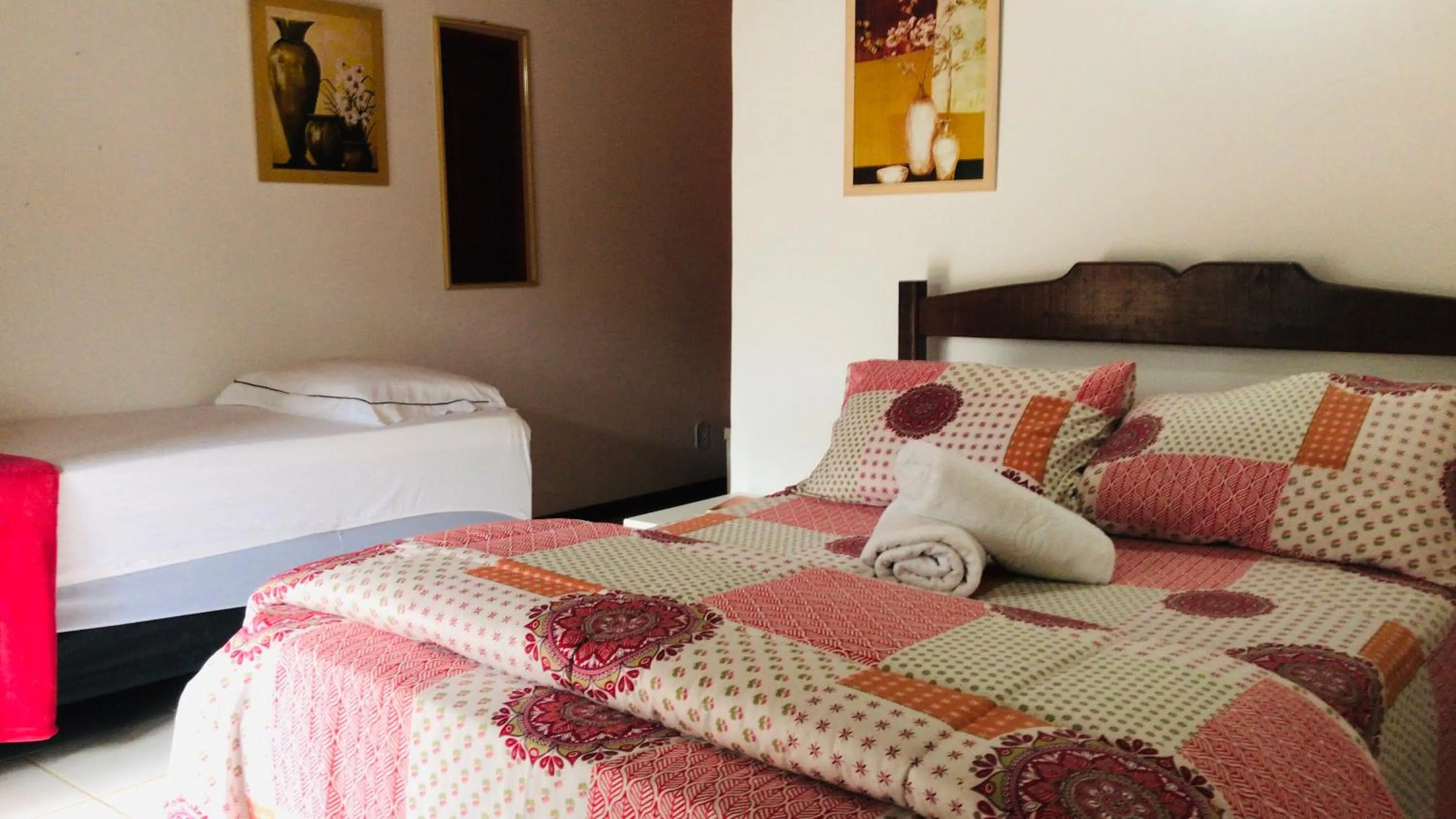 Bed in Pousada Cabanas da Serra Lumiar