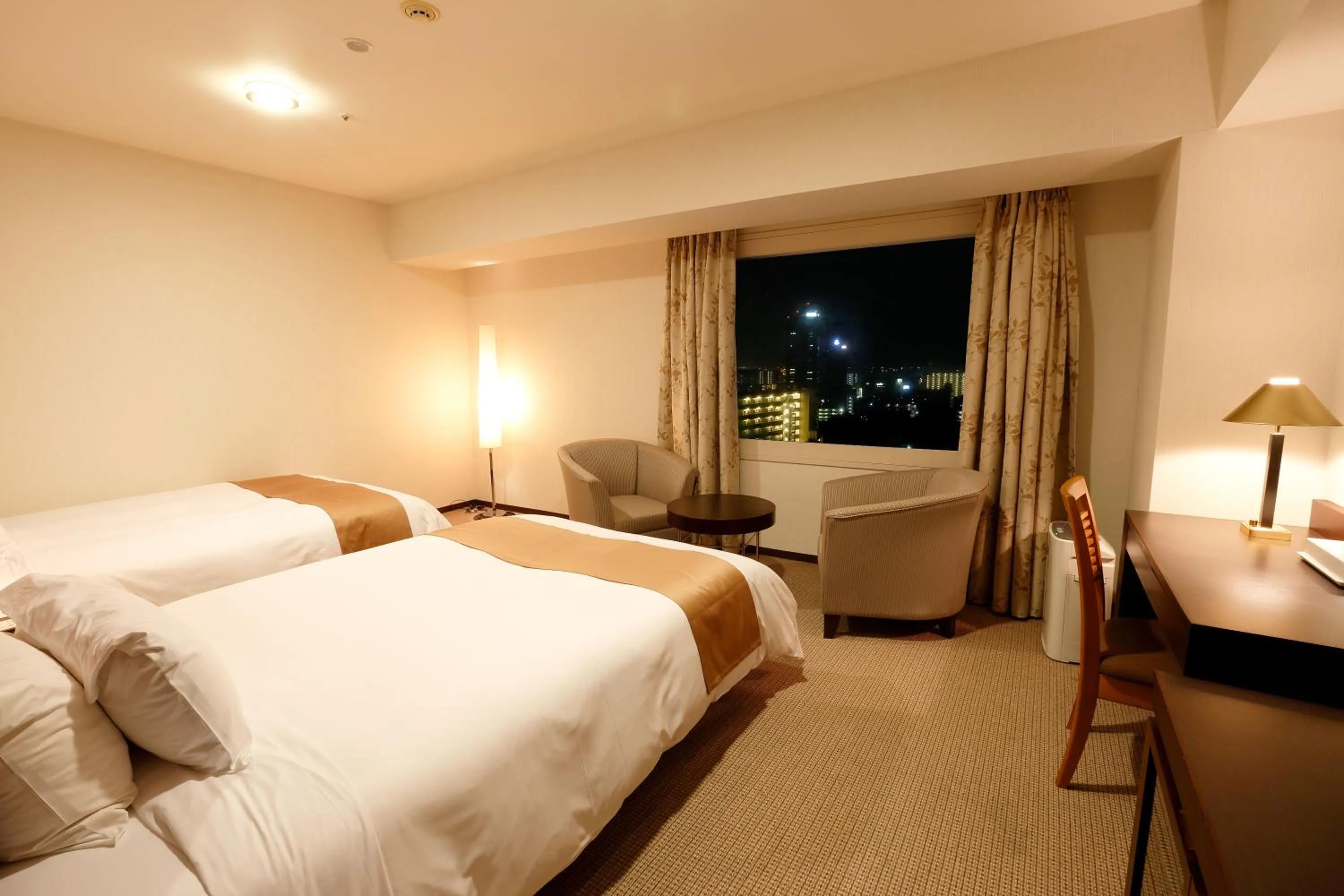 Bed in Keisei Hotel Miramare