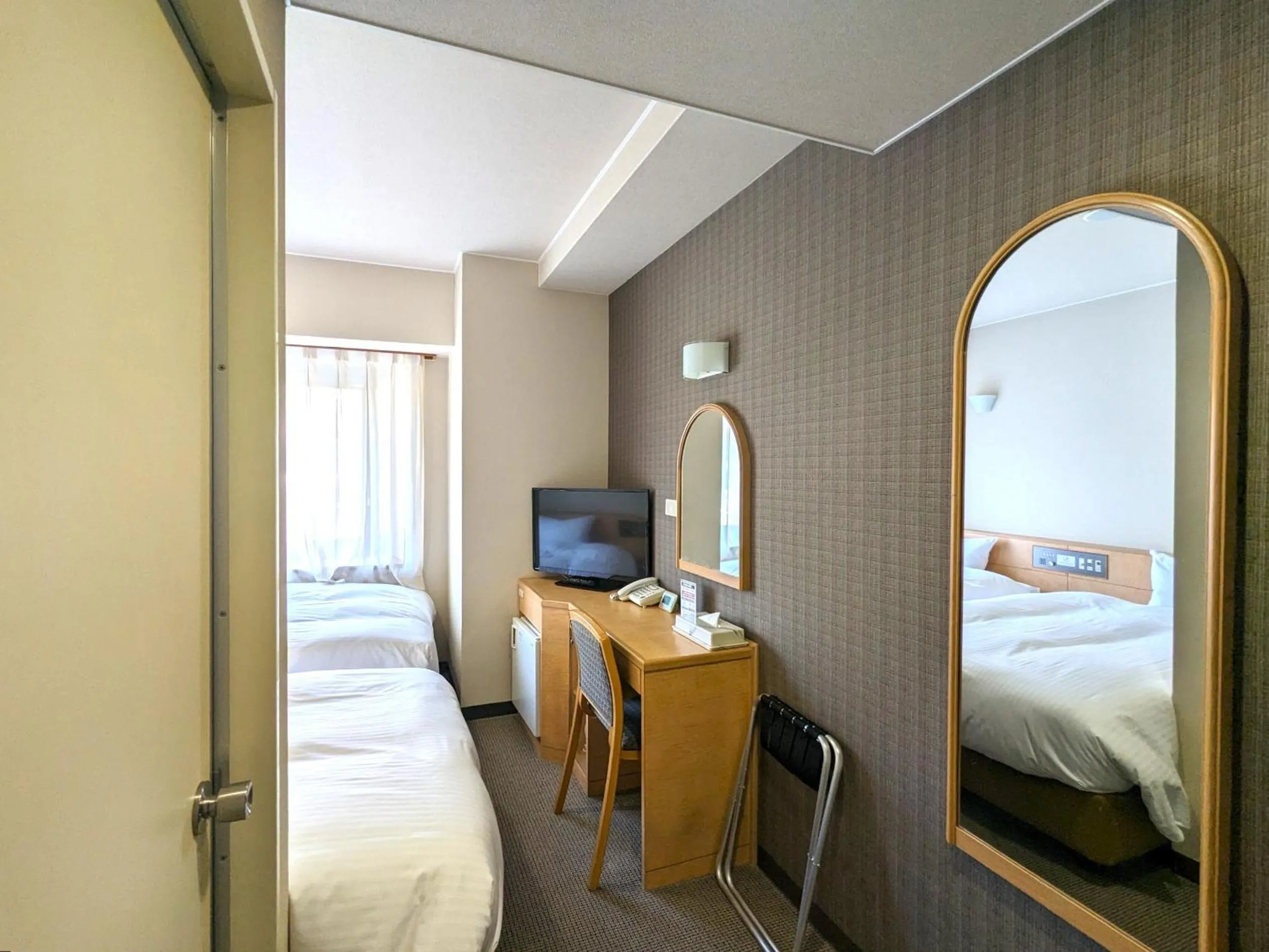 Photo of the whole room, Bed in Kenchomae Green Hotel