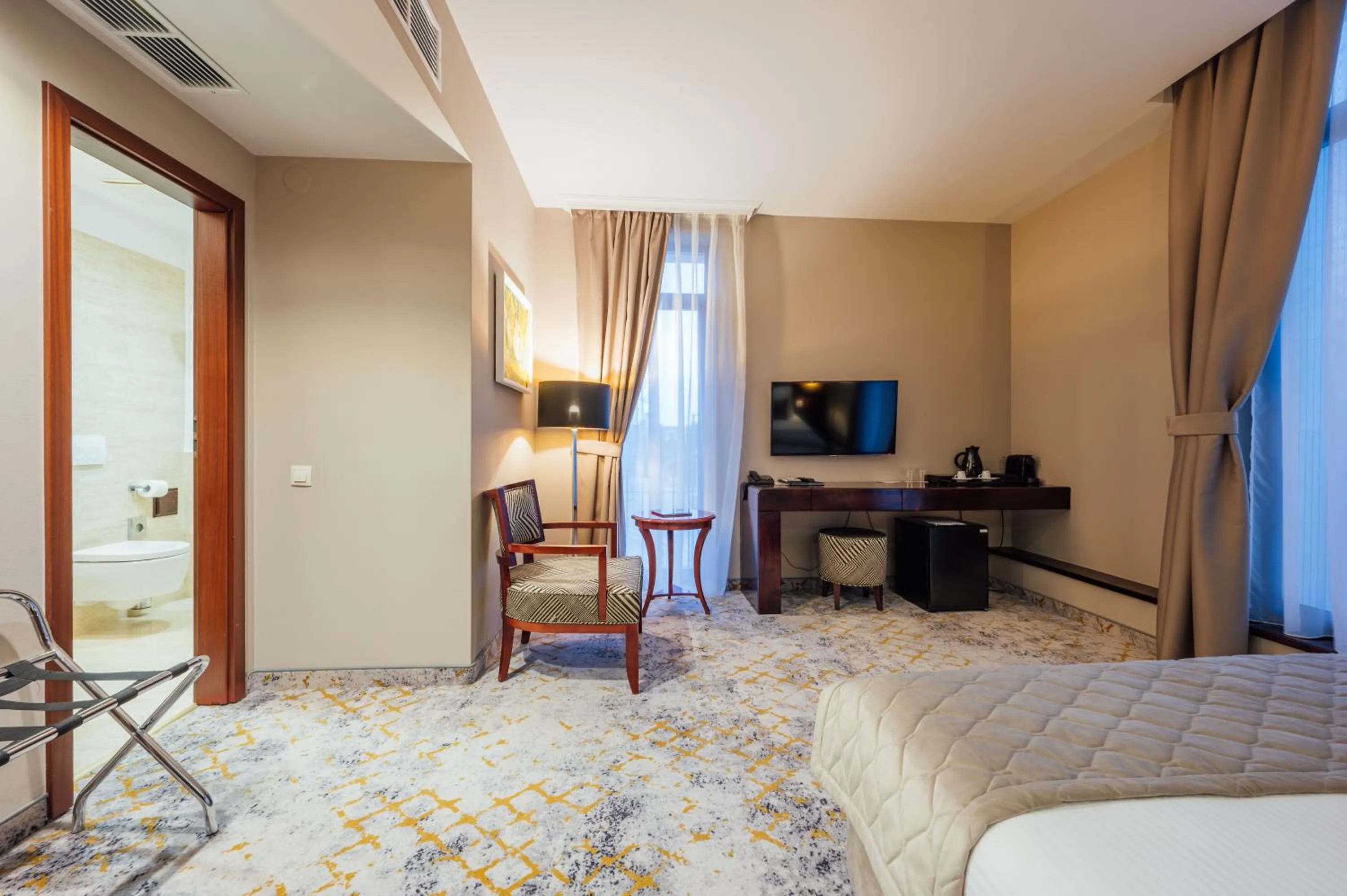 Bed in L`Art Hotel Carei