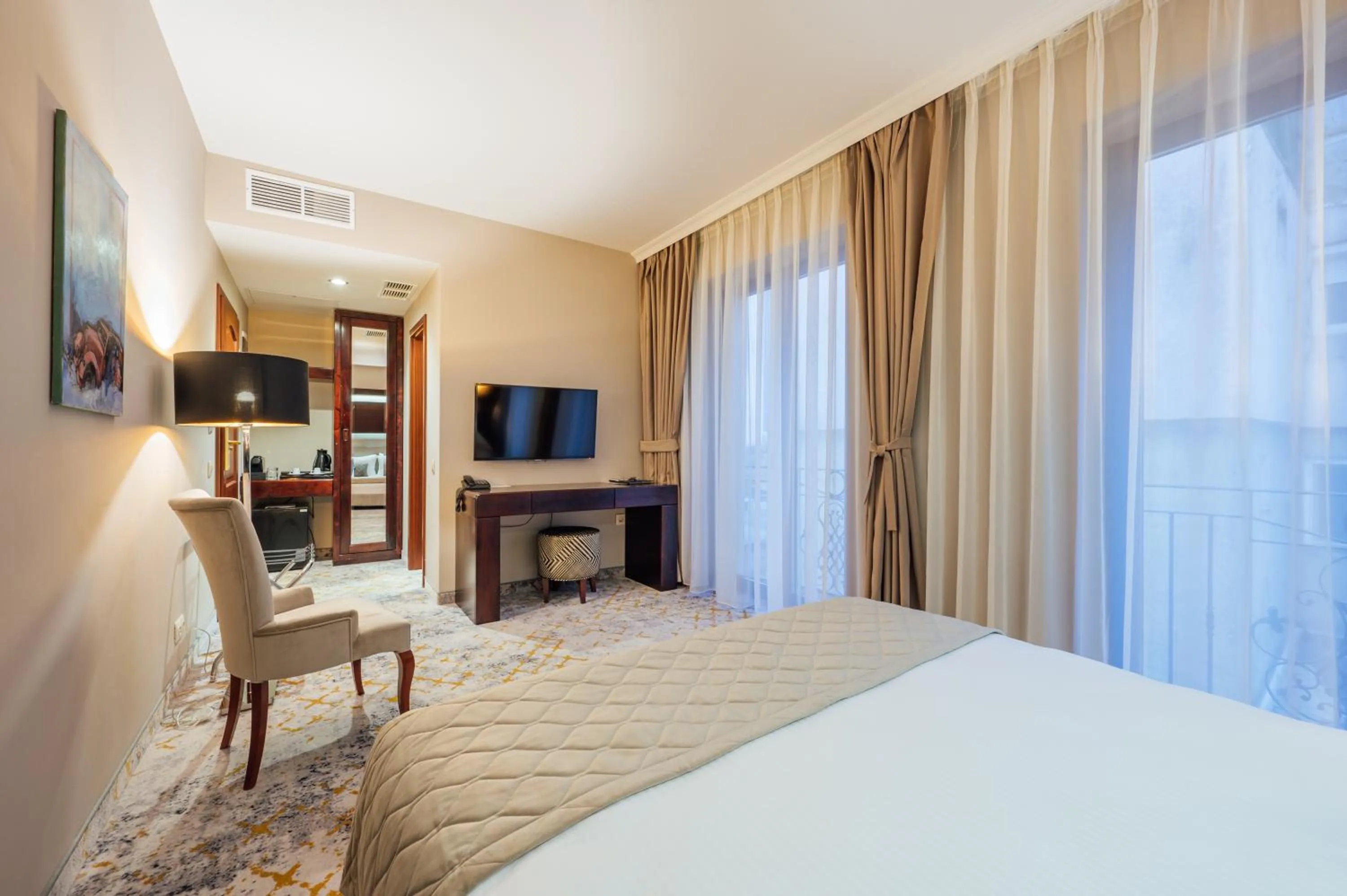 Bed in L`Art Hotel Carei