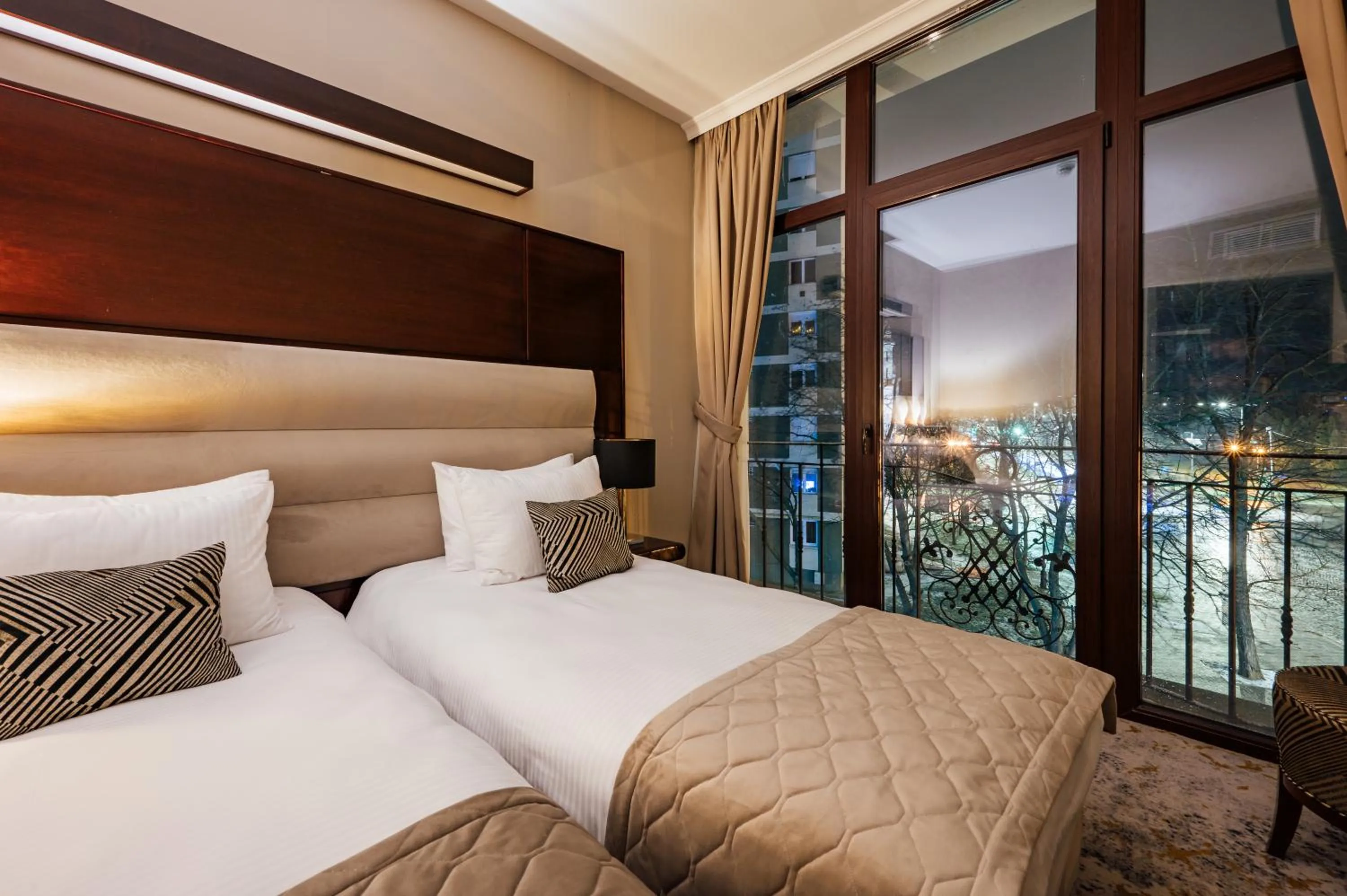 Bed in L`Art Hotel Carei