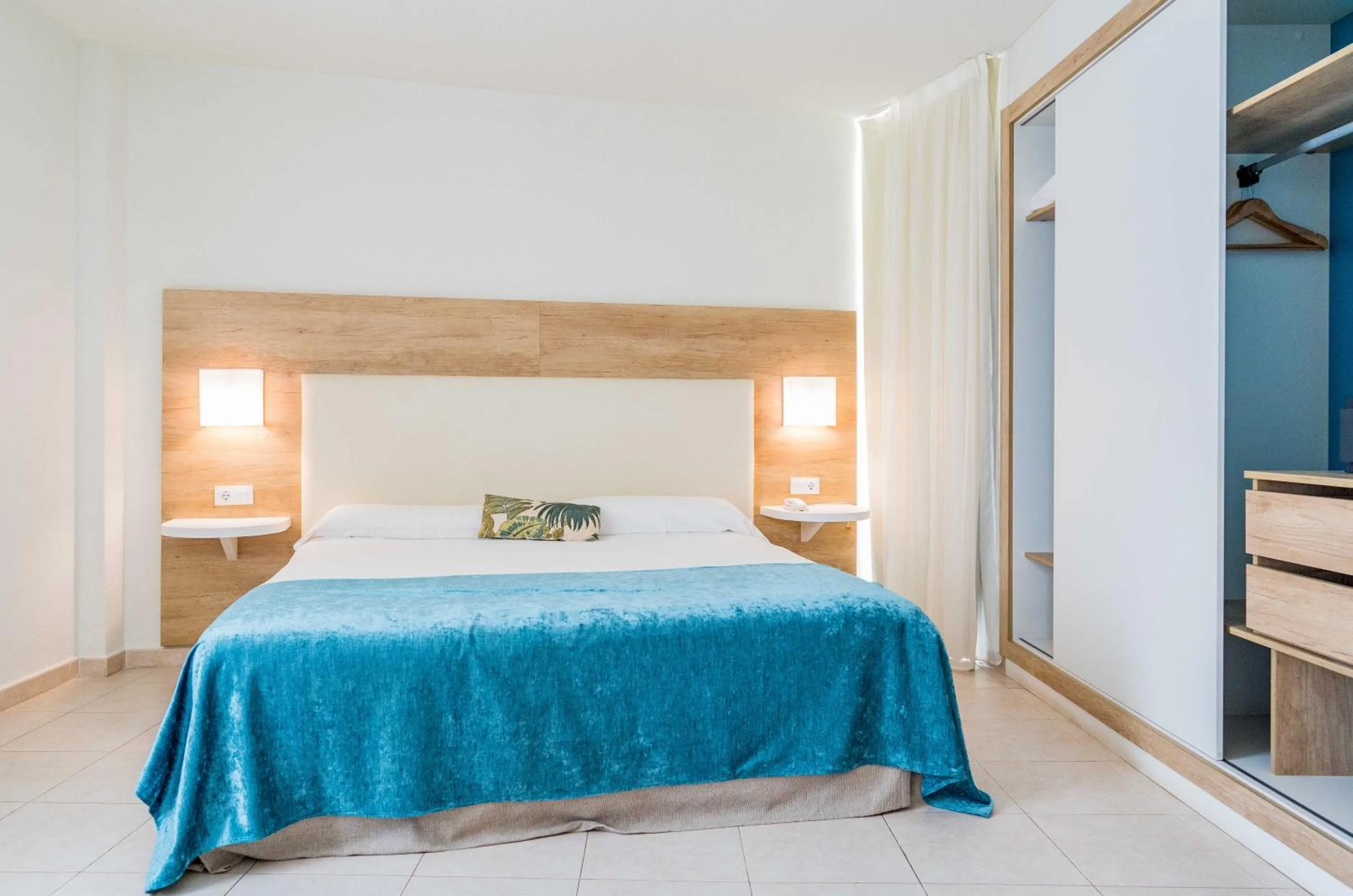 Bed in Gara Suites Golf & Spa