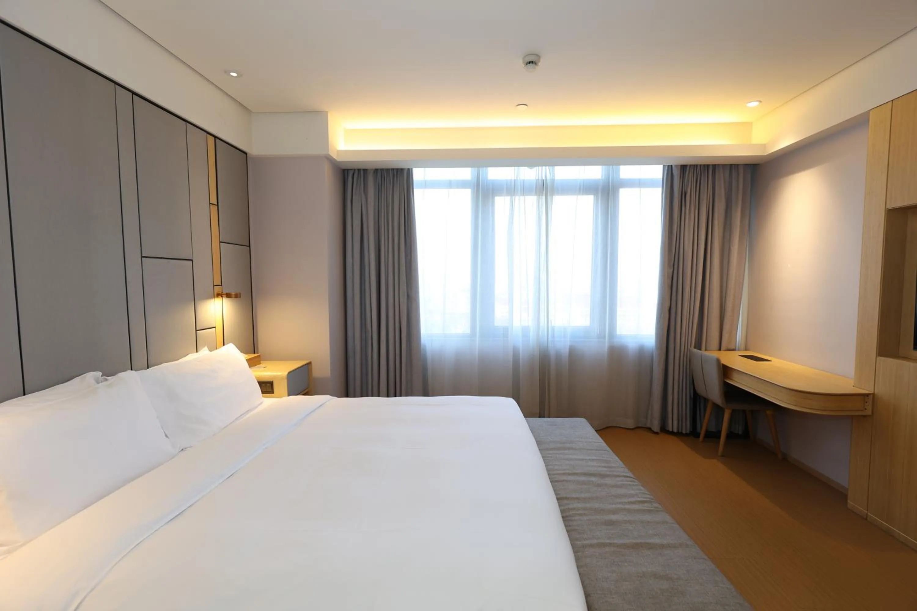 Bed in JI Hotel Shanghai Wujiaochang Shiguang Road