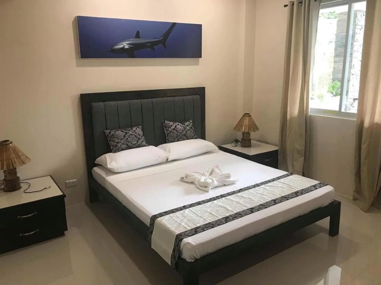 Bed in Avila's Horizon Dive Resort Malapascua