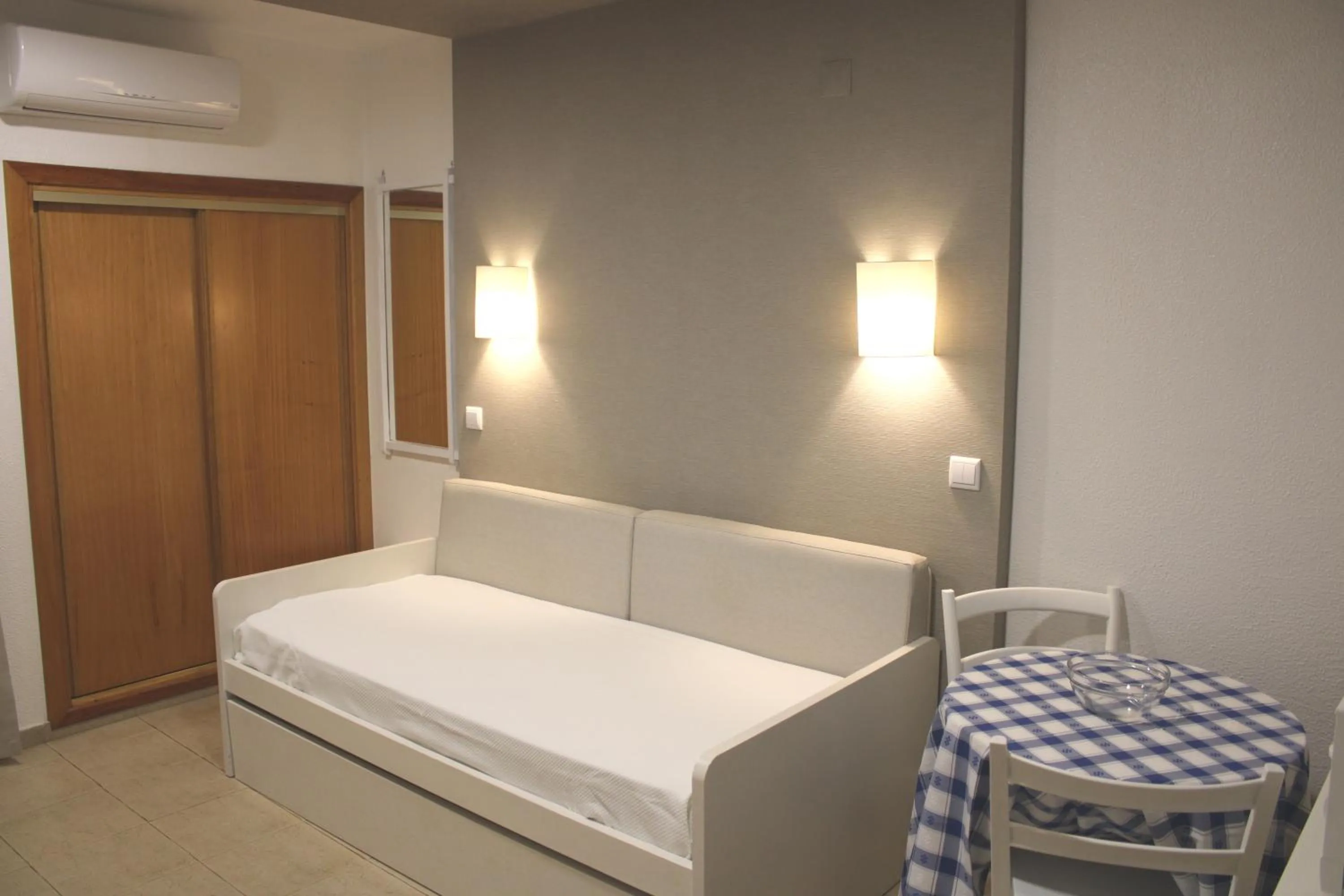 Bed in Apartamentos Vale de Carros by Umbral