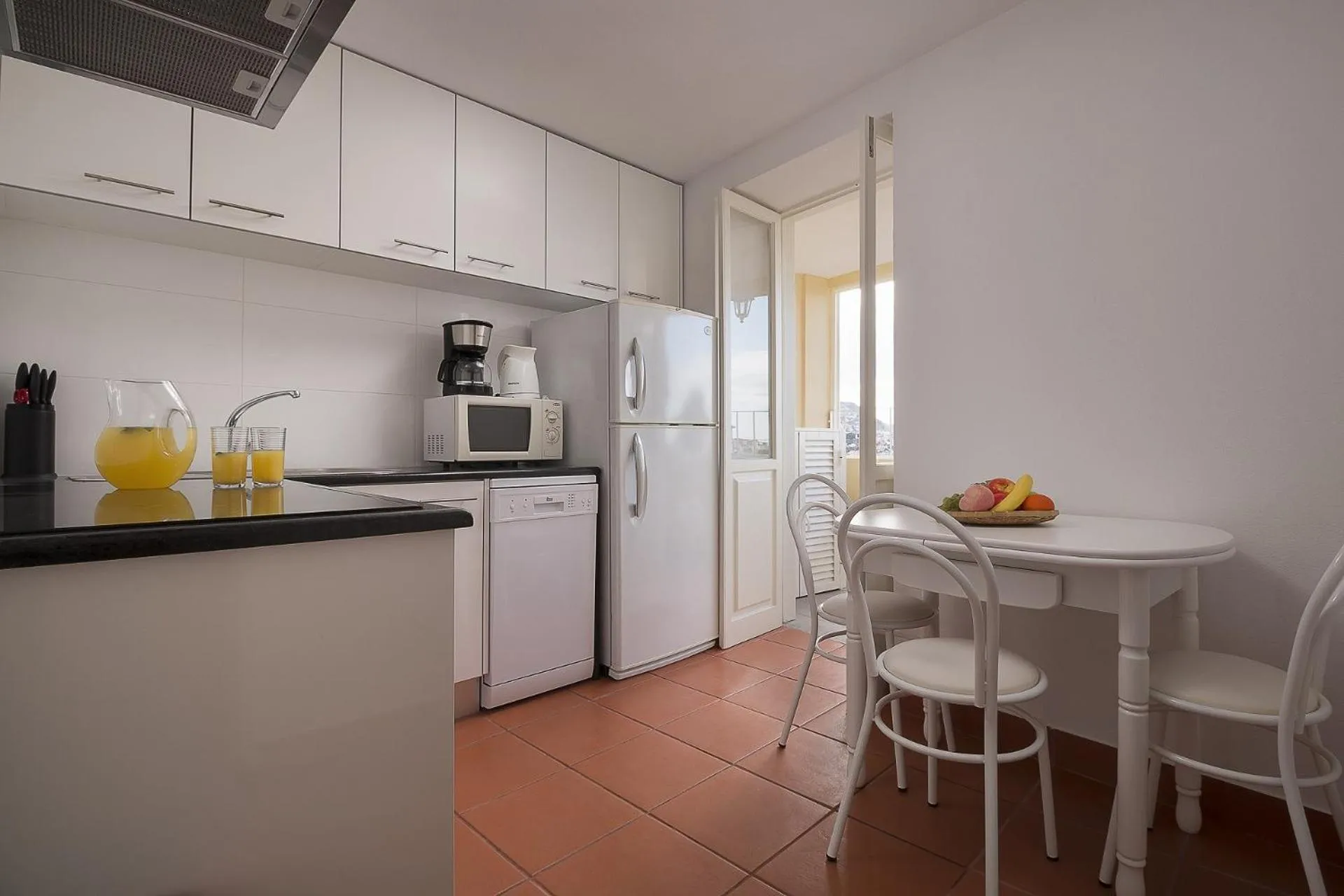 Kitchen or kitchenette in Funchal Window by Homie