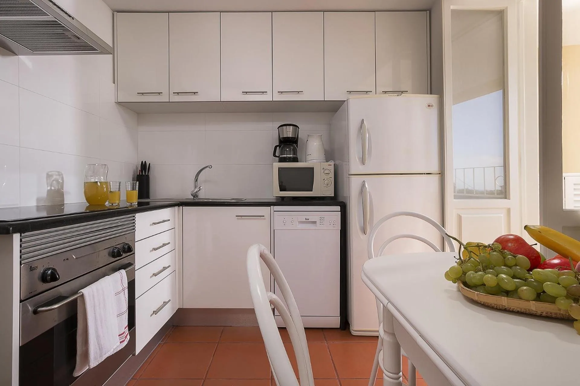 Kitchen or kitchenette in Funchal Window by Homie