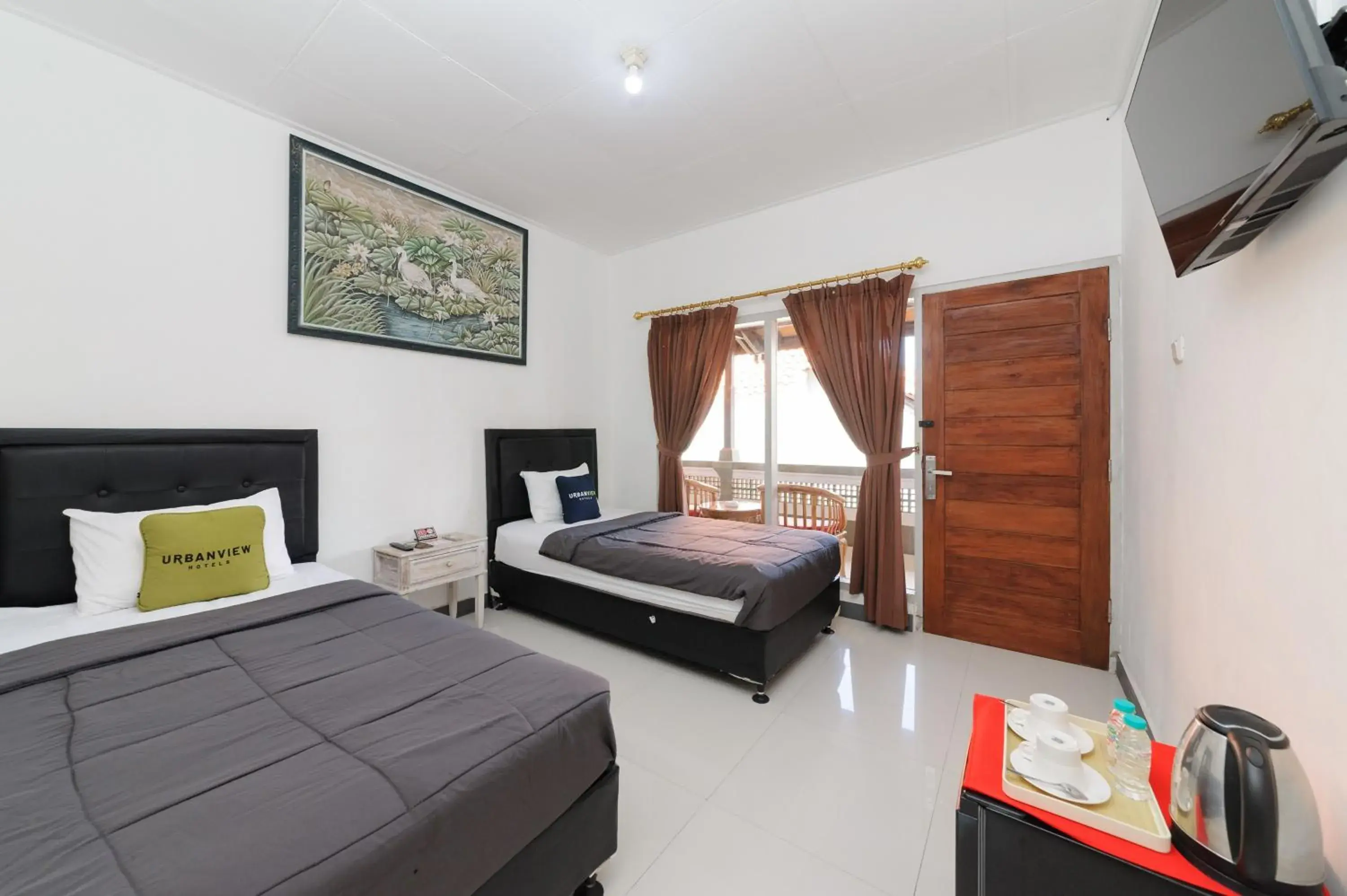 Standard Twin Room in Urbanview Hotel Rasa Sayang Inn Tanjung Benoa Bali Standard Twin Room in Urbanview Hotel Rasa Sayang Inn Tanjung Benoa Bali