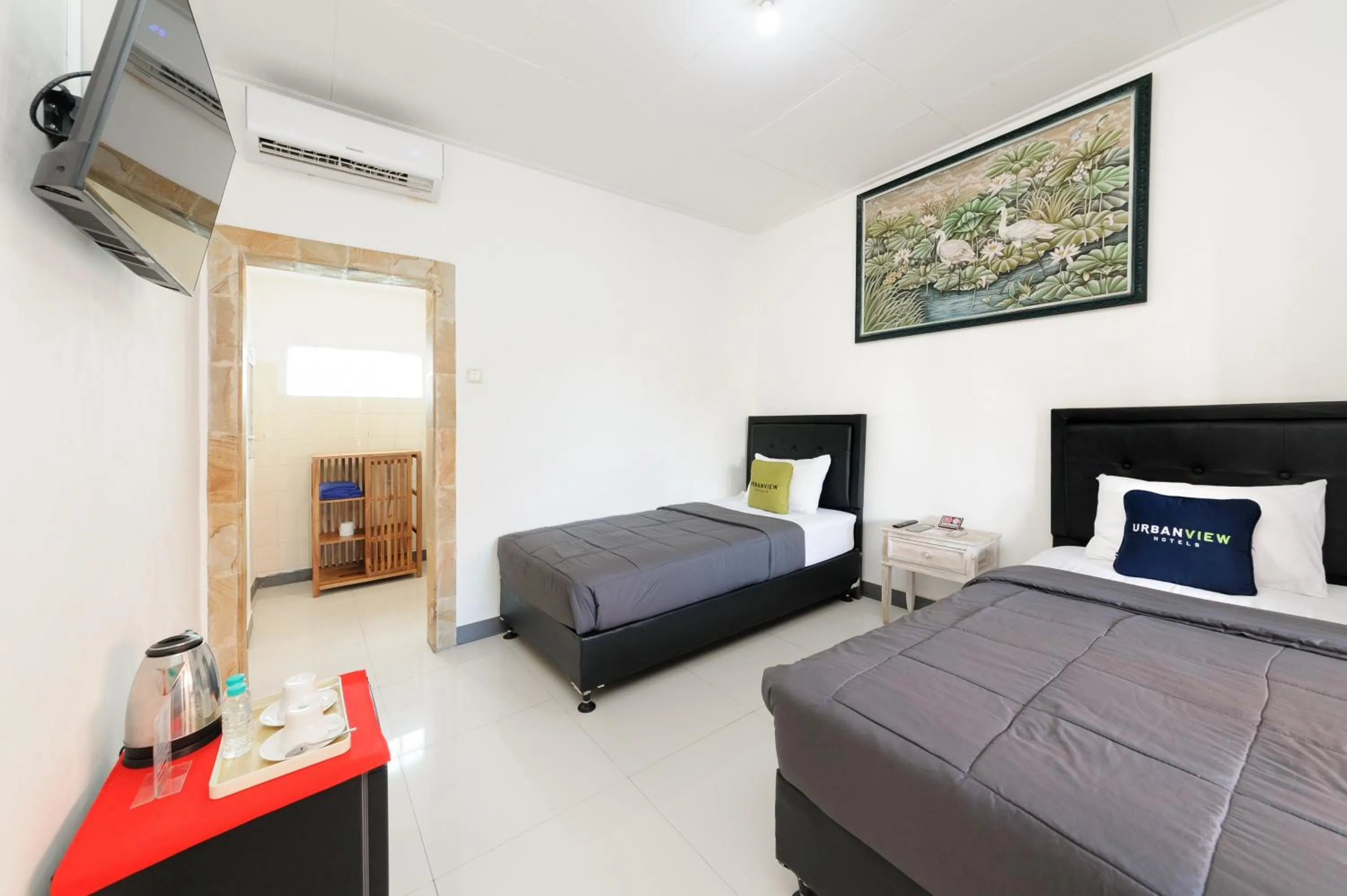 Bedroom, Bed in Urbanview Hotel Rasa Sayang Inn Tanjung Benoa Bali