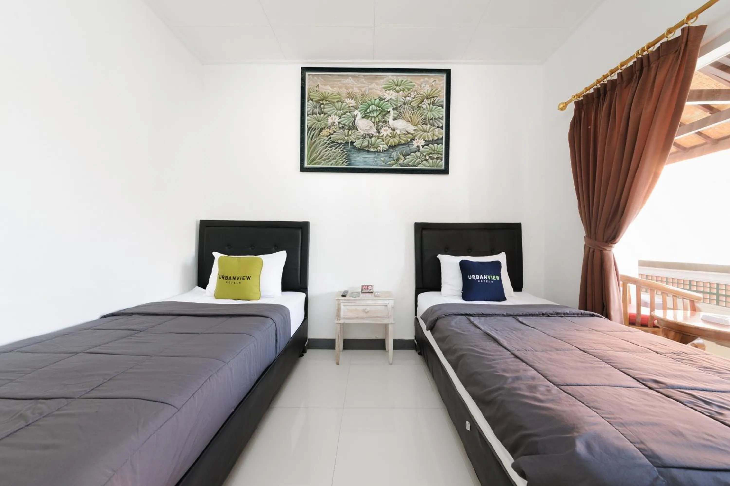Bedroom, Bed in Urbanview Hotel Rasa Sayang Inn Tanjung Benoa Bali