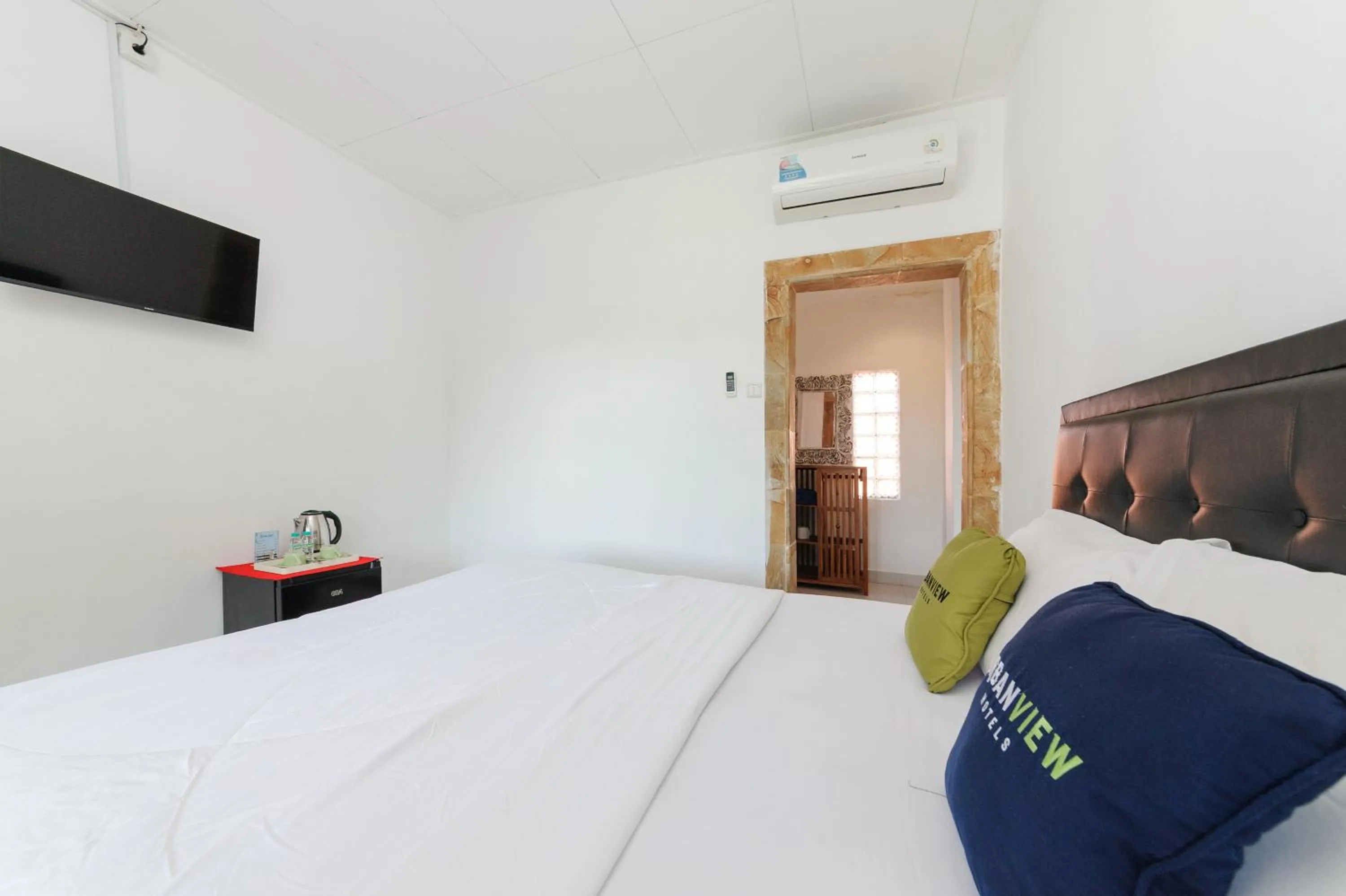 Bedroom, Bed in Urbanview Hotel Rasa Sayang Inn Tanjung Benoa Bali