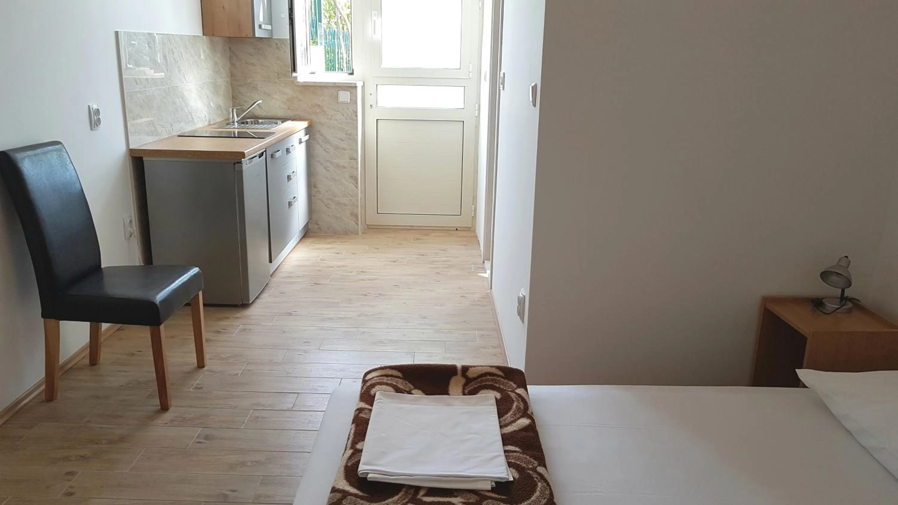 Kitchen or kitchenette, Bed in Apartments Kust
