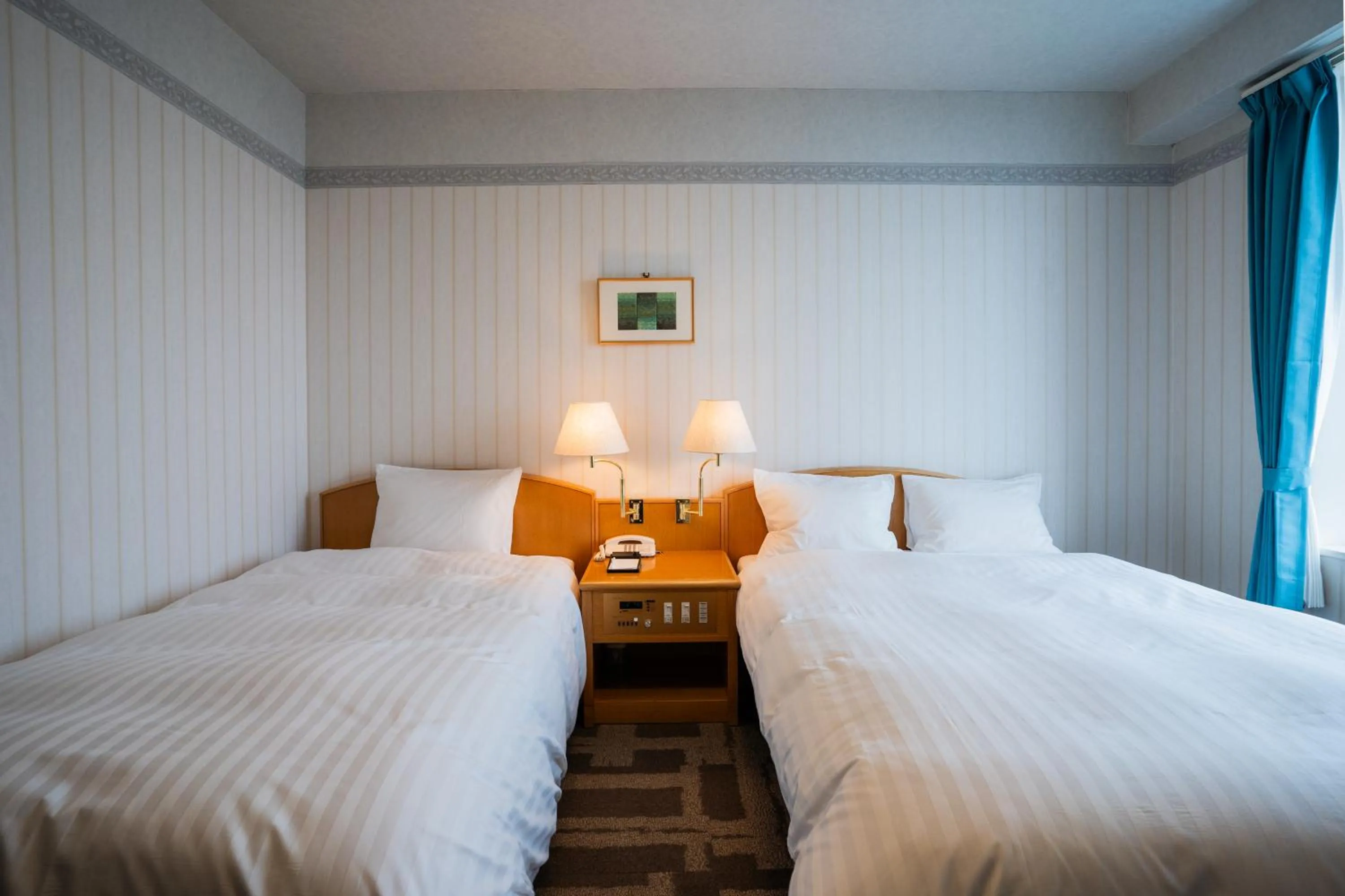 Bed in Hotel Welview Kagoshima