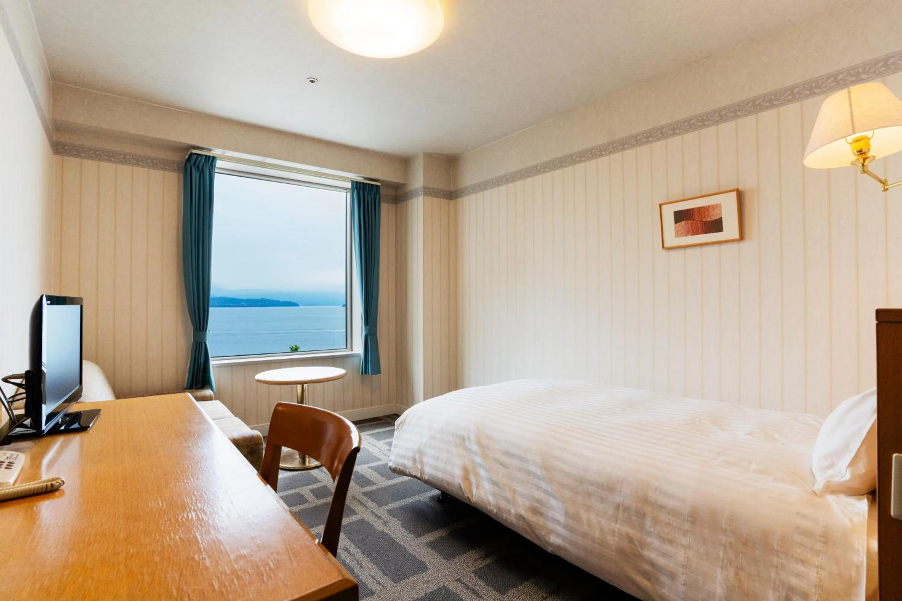 Bed in Hotel Welview Kagoshima