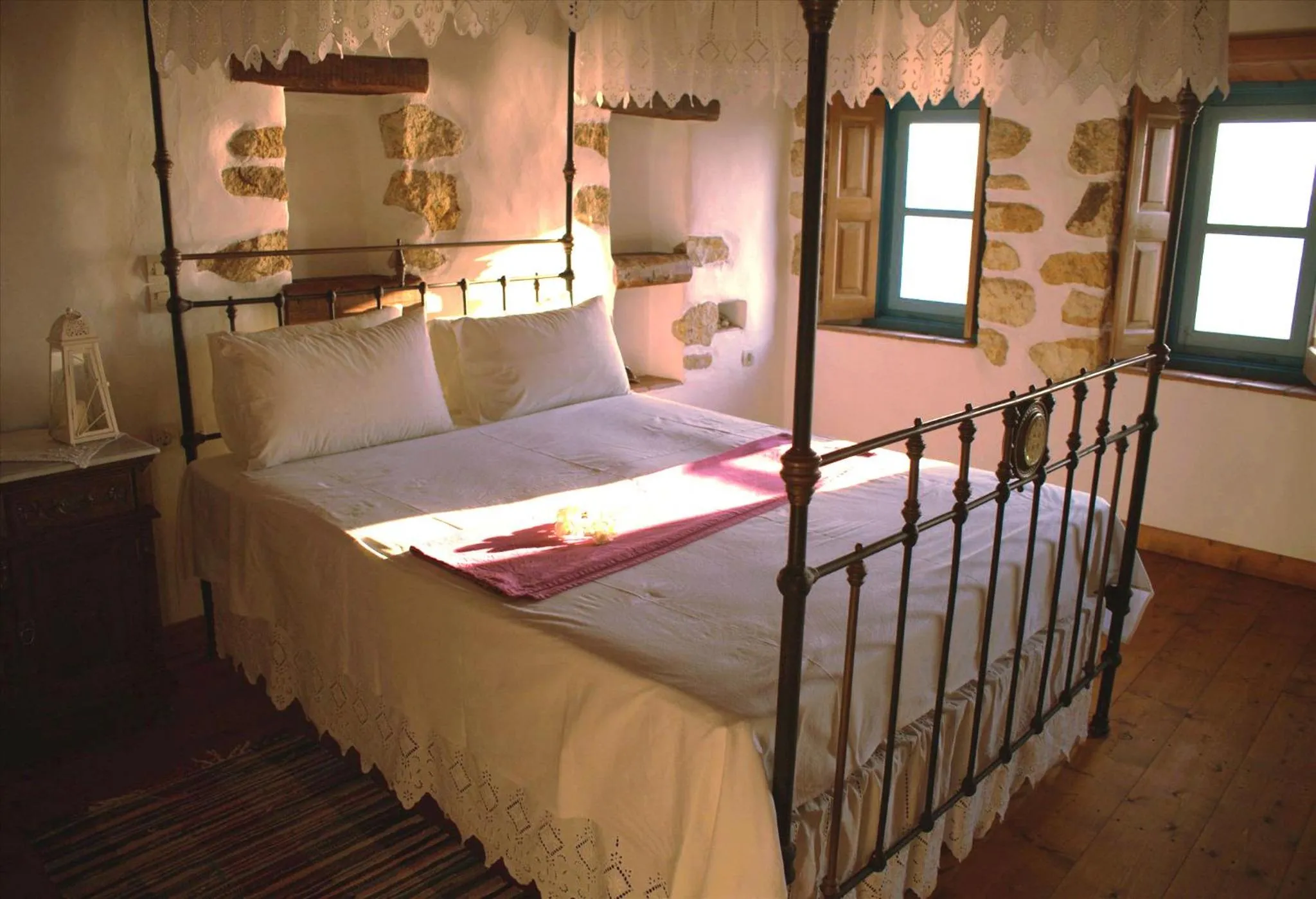 Bed in Eirini Luxury Hotel Villas