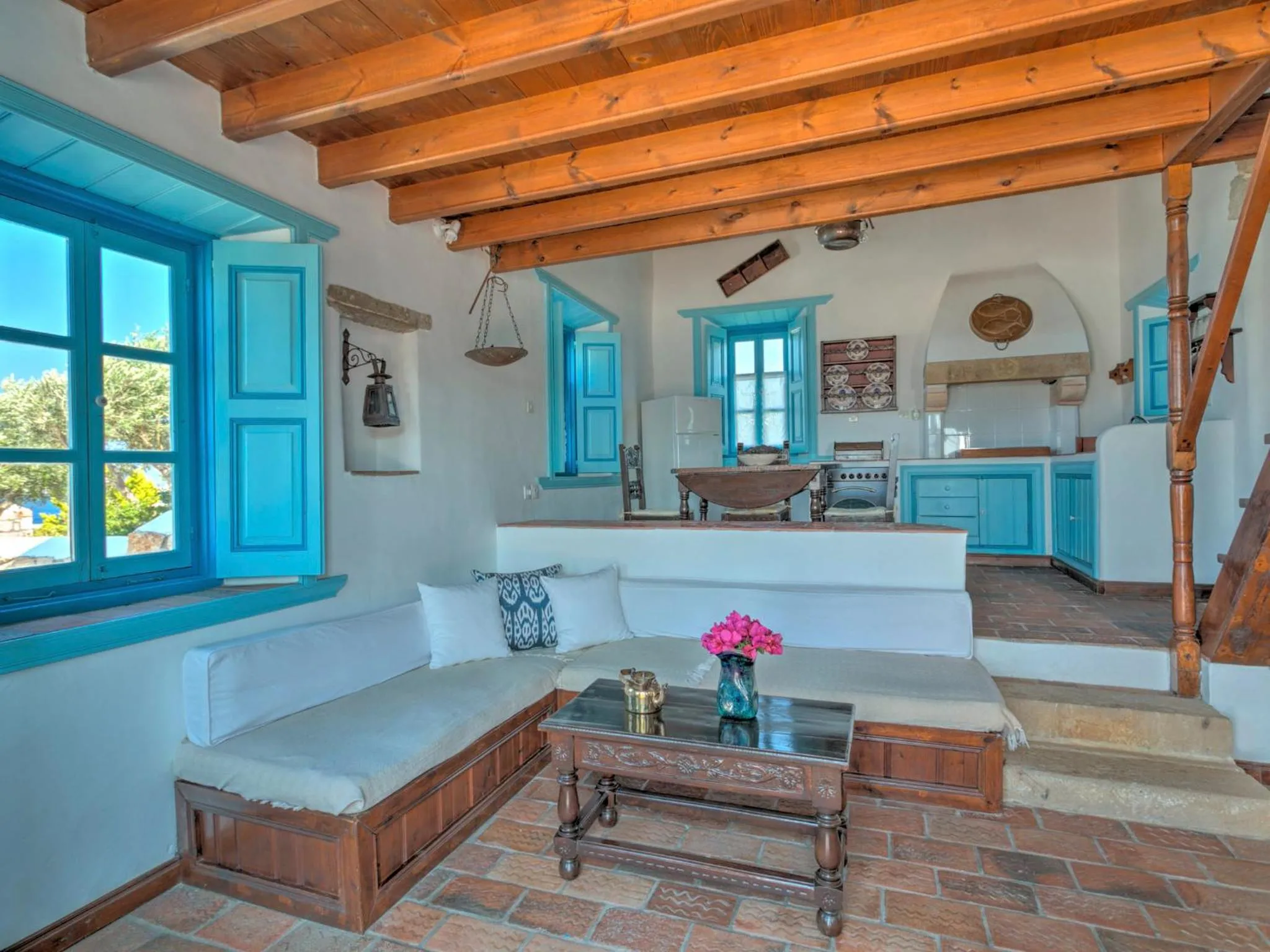 Kitchen or kitchenette in Eirini Luxury Hotel Villas