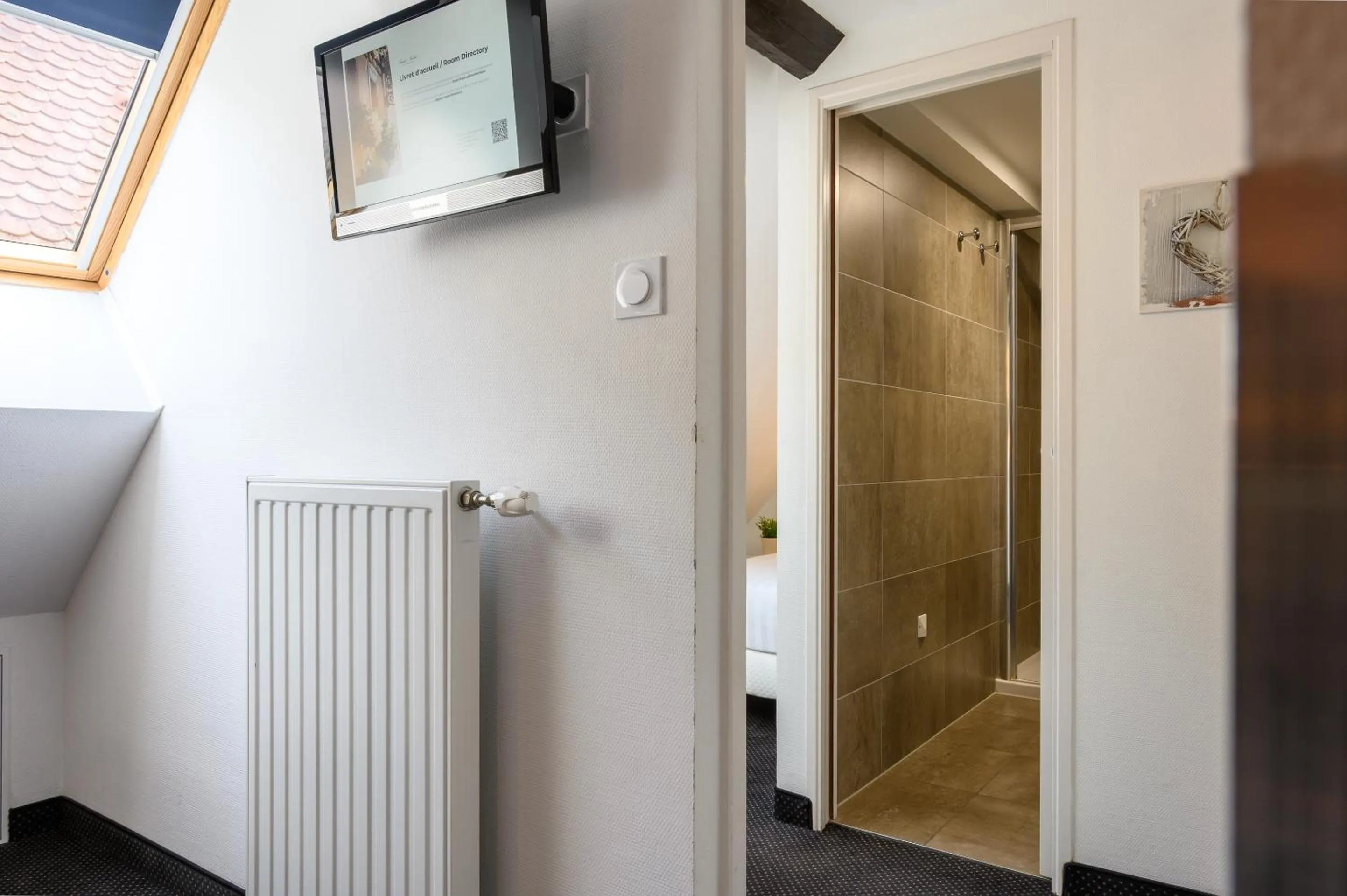 Photo of the whole room in Hôtel le Saint Nicolas