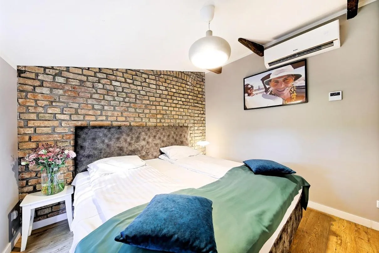 Bed in Cinema Apartments