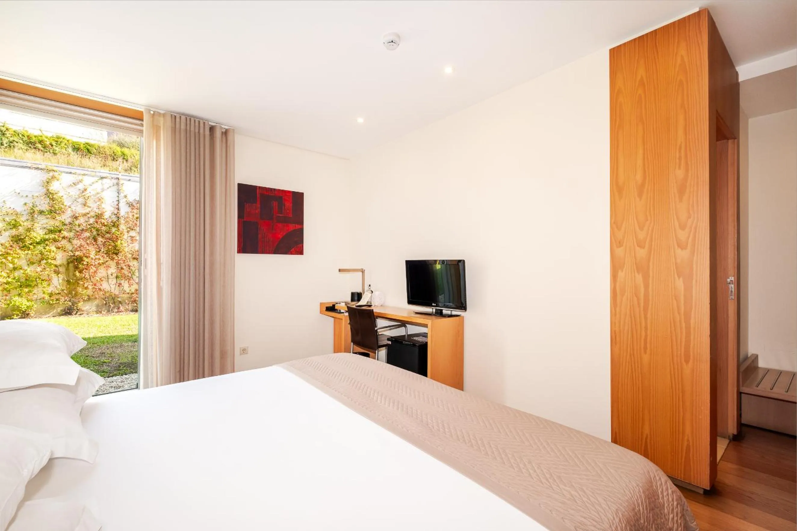 Bedroom, Bed in Axis Ponte de Lima Golf Resort Hotel