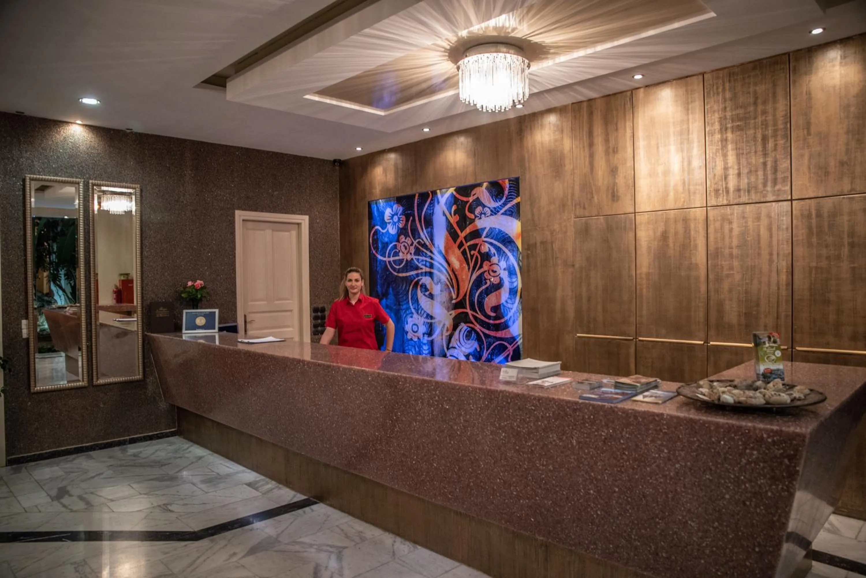 Lobby or reception in Alma Hotel