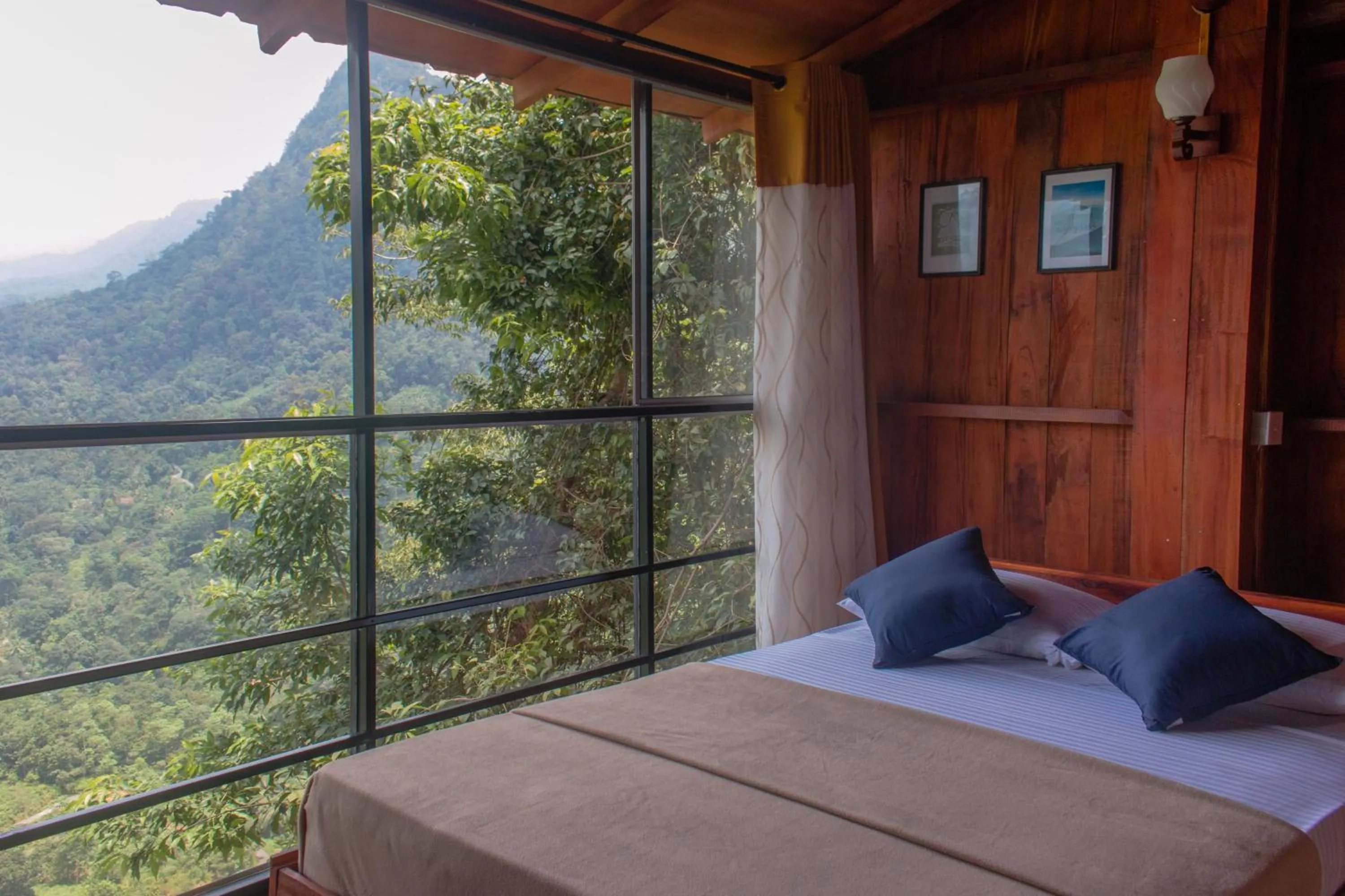 Mountain view, Bed in Tree Houses by Jungle River
