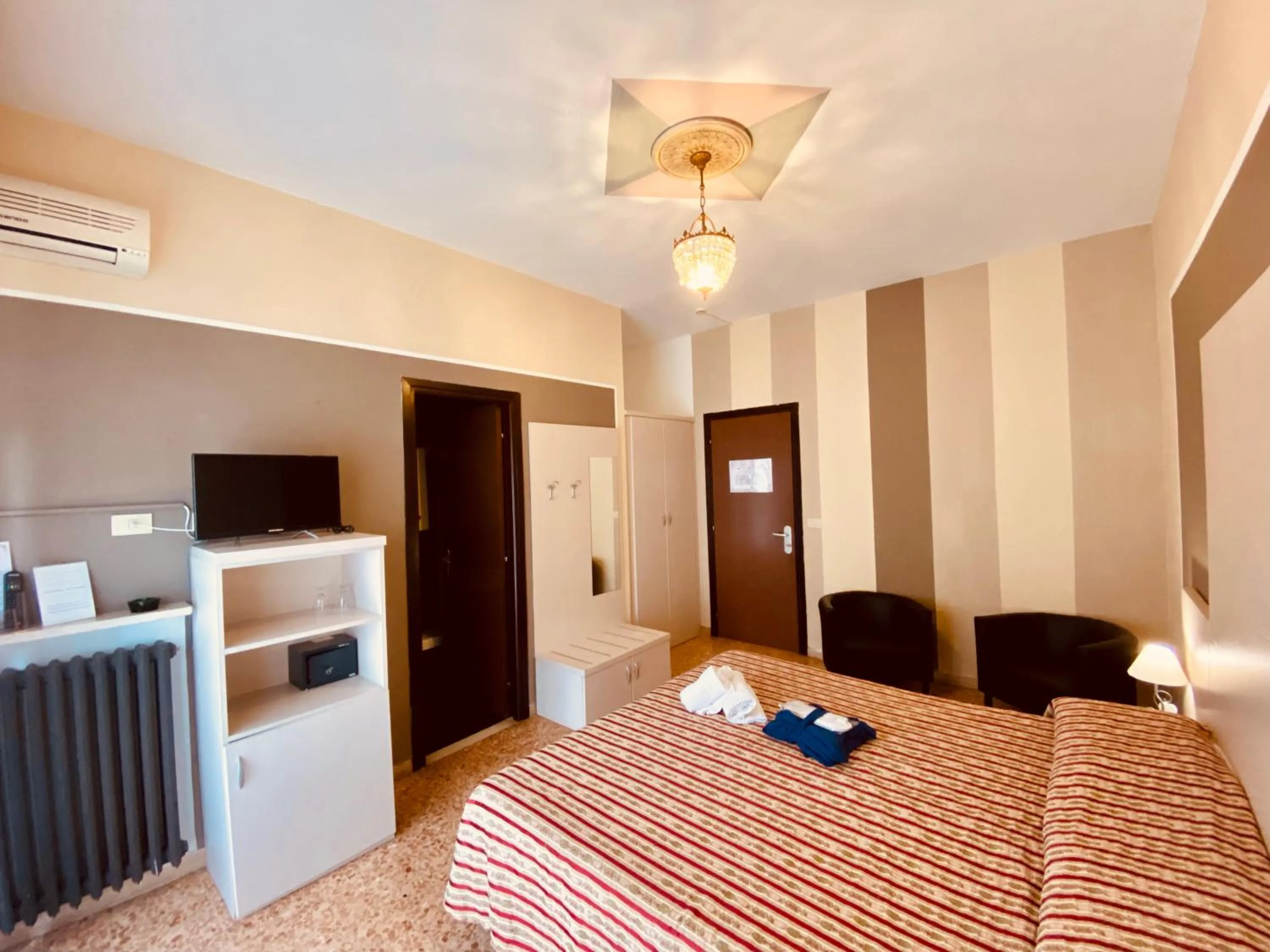 Bed in Art Hotel Pandos