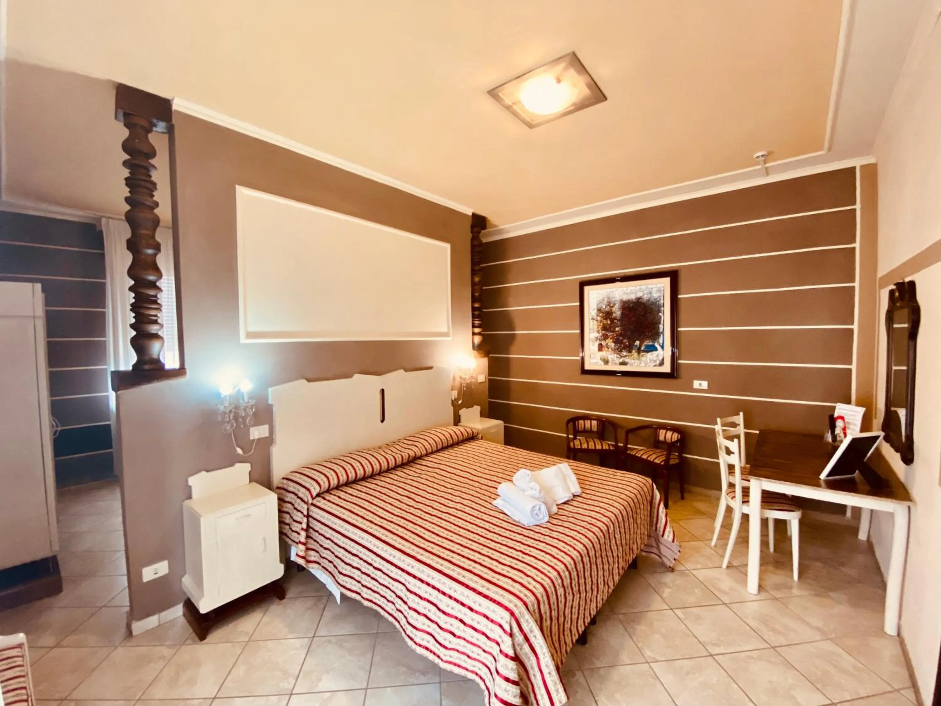 Bed in Art Hotel Pandos