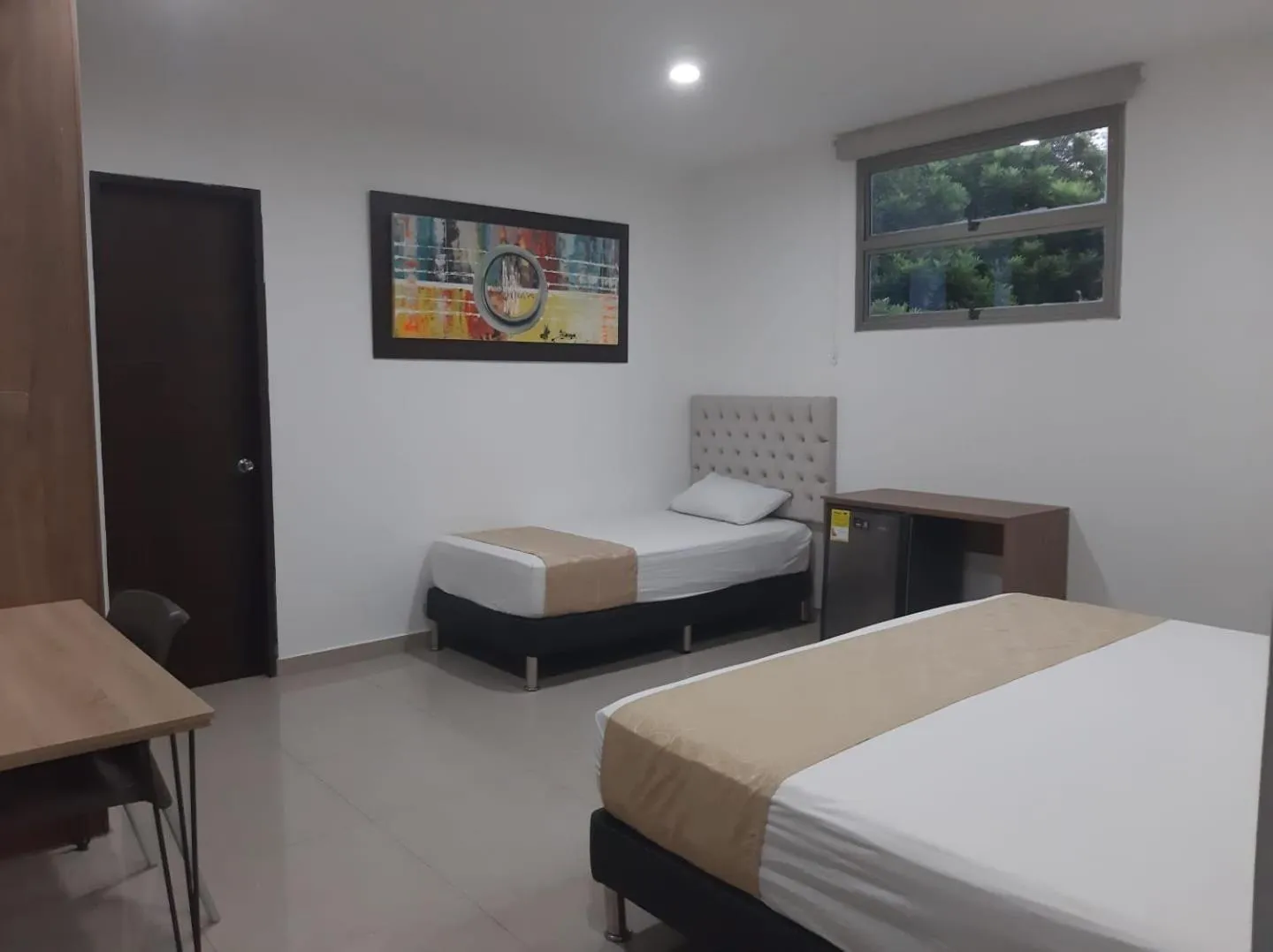 Bed in Genesis Hotel