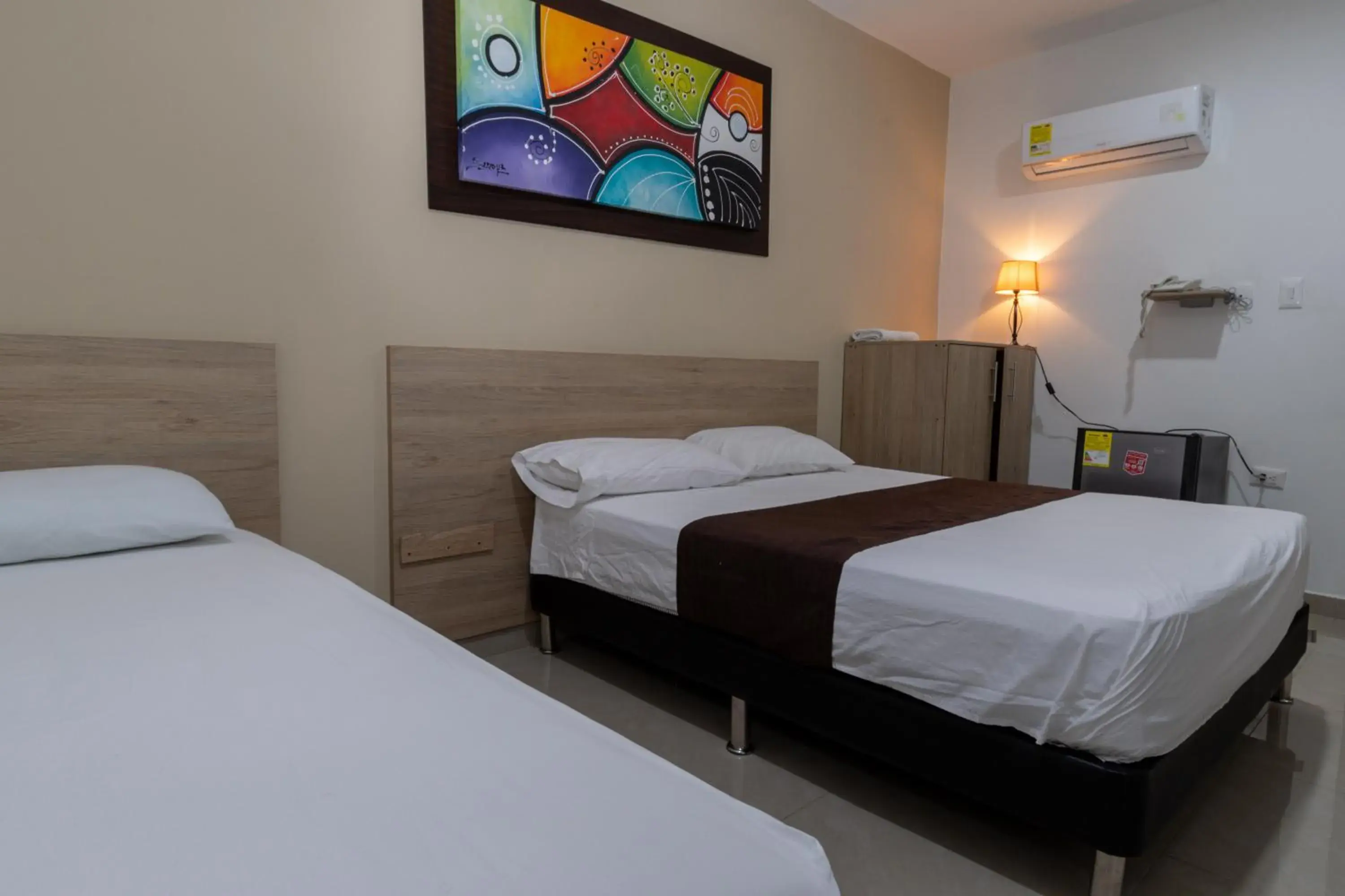 Classic Triple Room in Genesis Hotel Classic Triple Room in Genesis Hotel