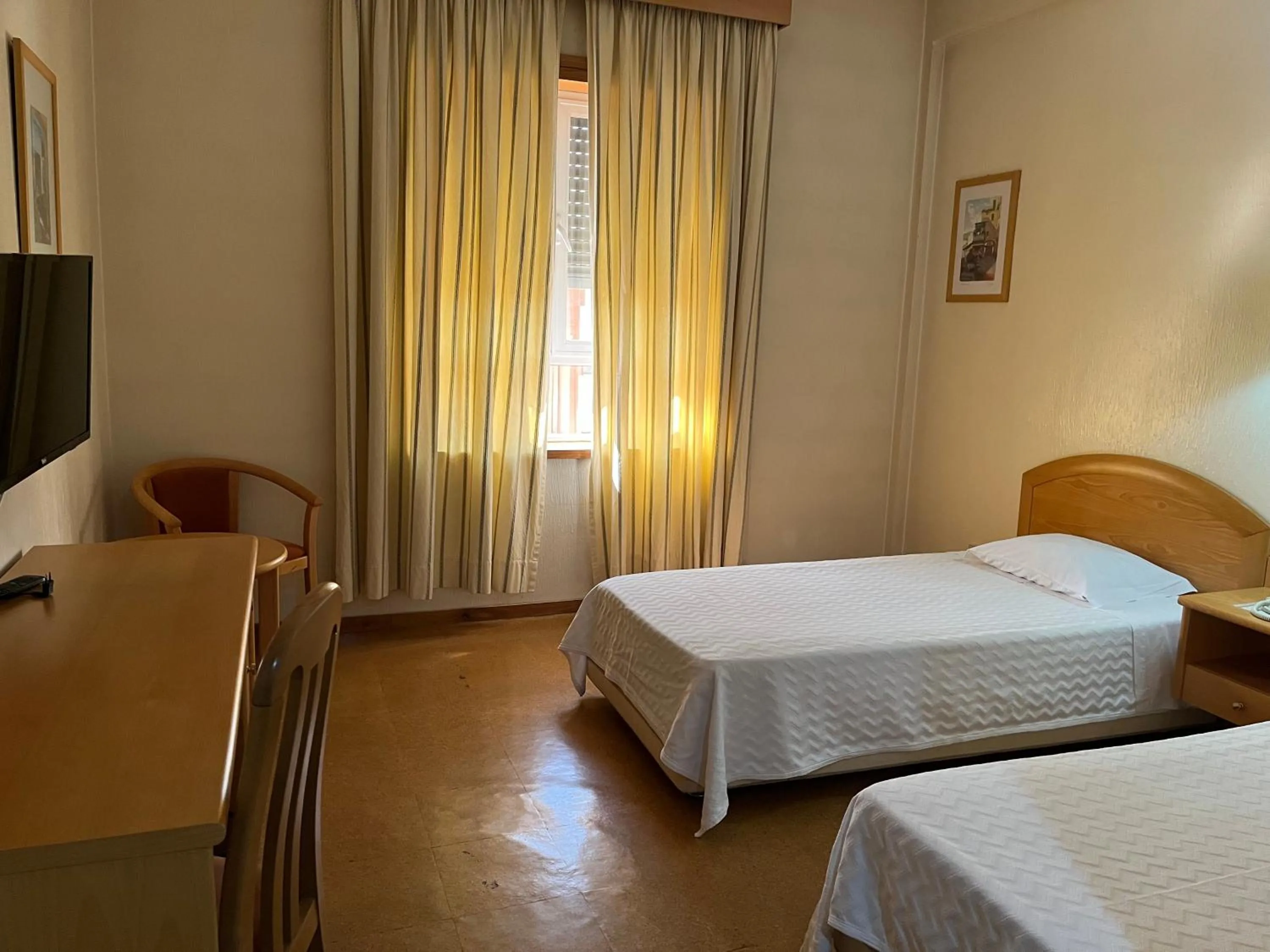 Bed in Grande Hotel Dom Dinis