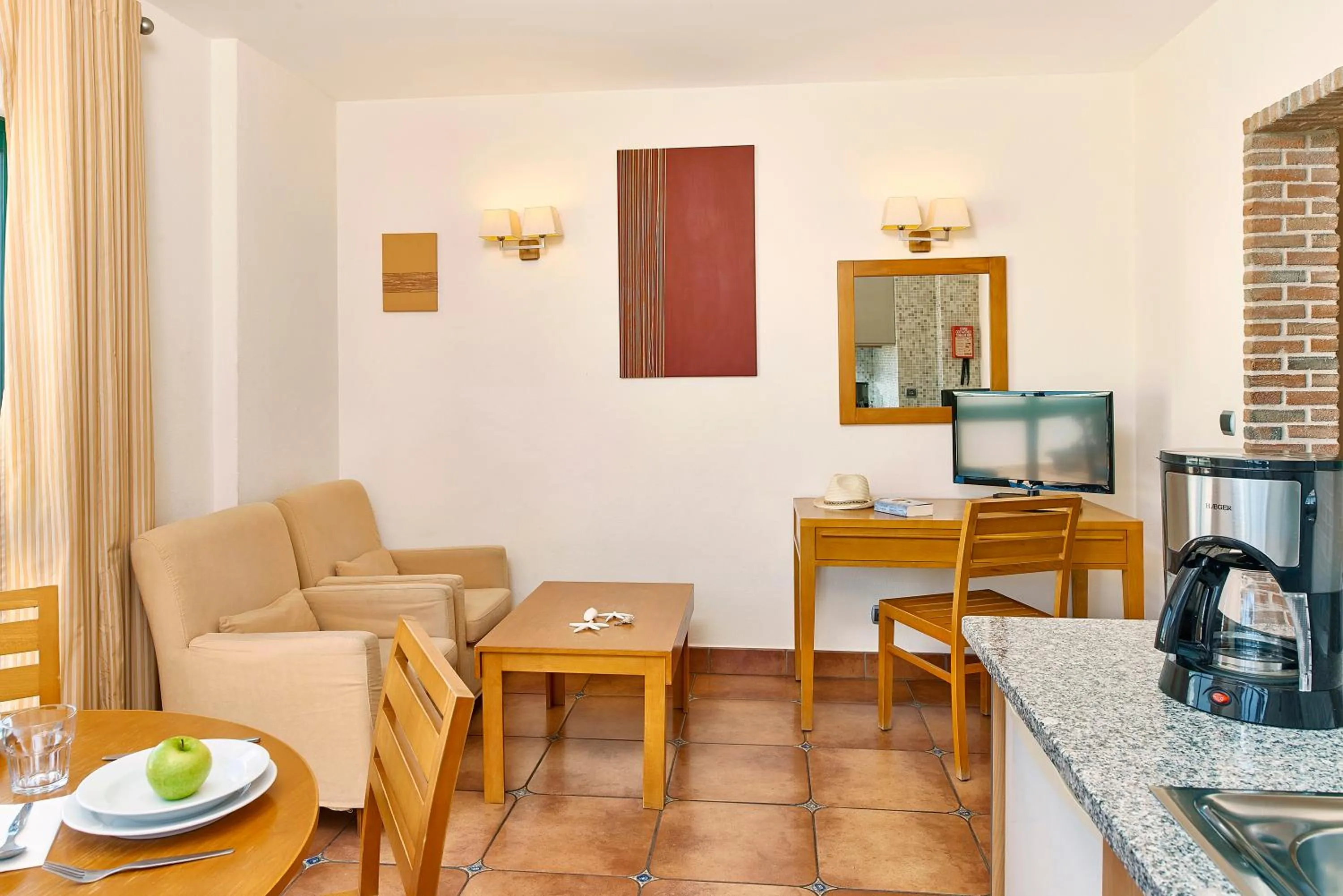 Living room in Oceanus Aparthotel