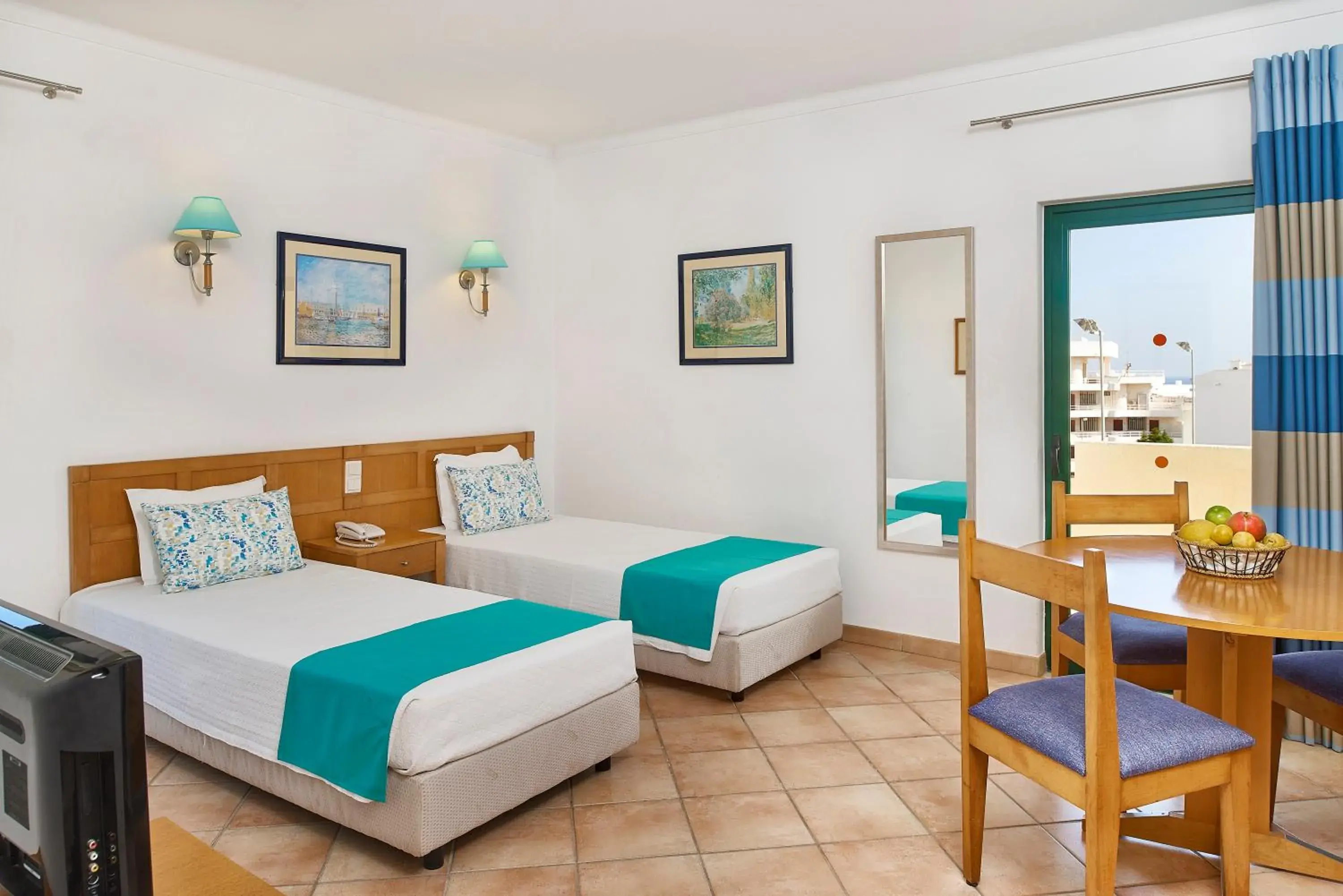 Bed in Oceanus Aparthotel Bed in Oceanus Aparthotel