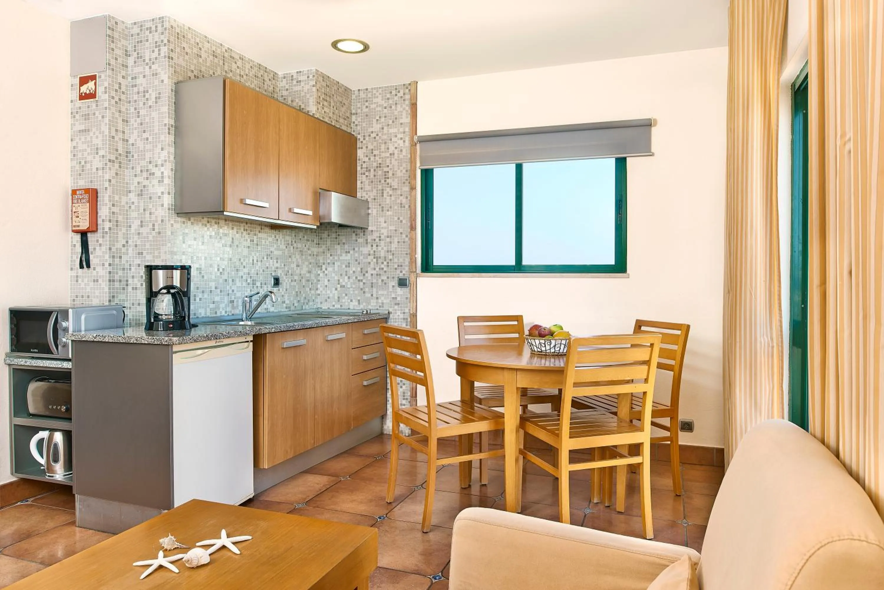 Kitchen or kitchenette in Oceanus Aparthotel