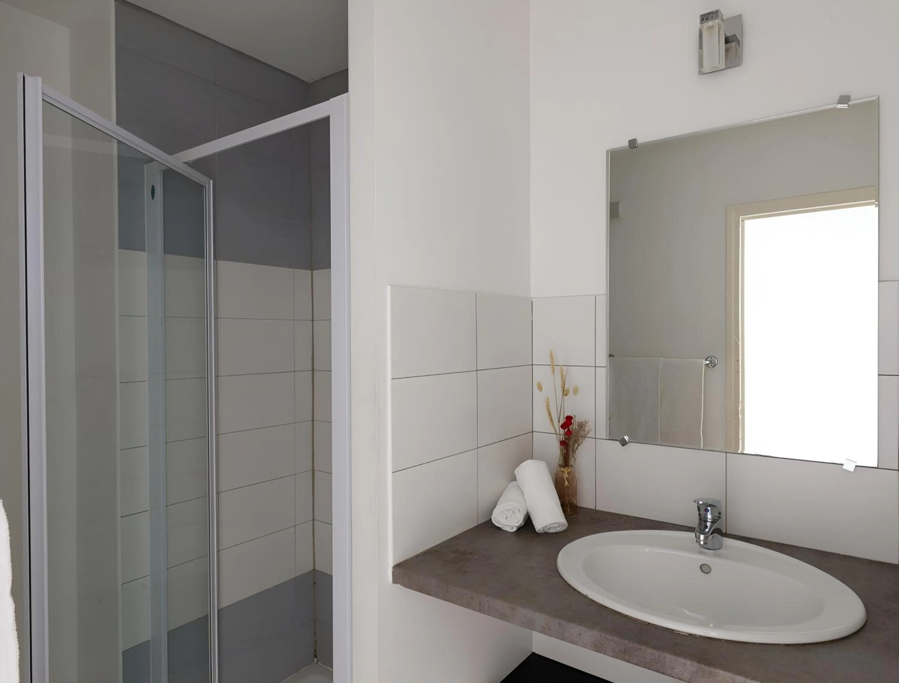 Bathroom in Appart Hotel Corte HR