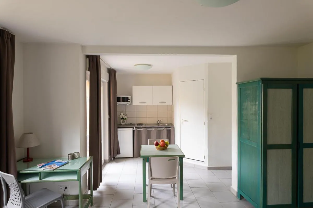 Kitchen or kitchenette in Appart Hotel Corte HR