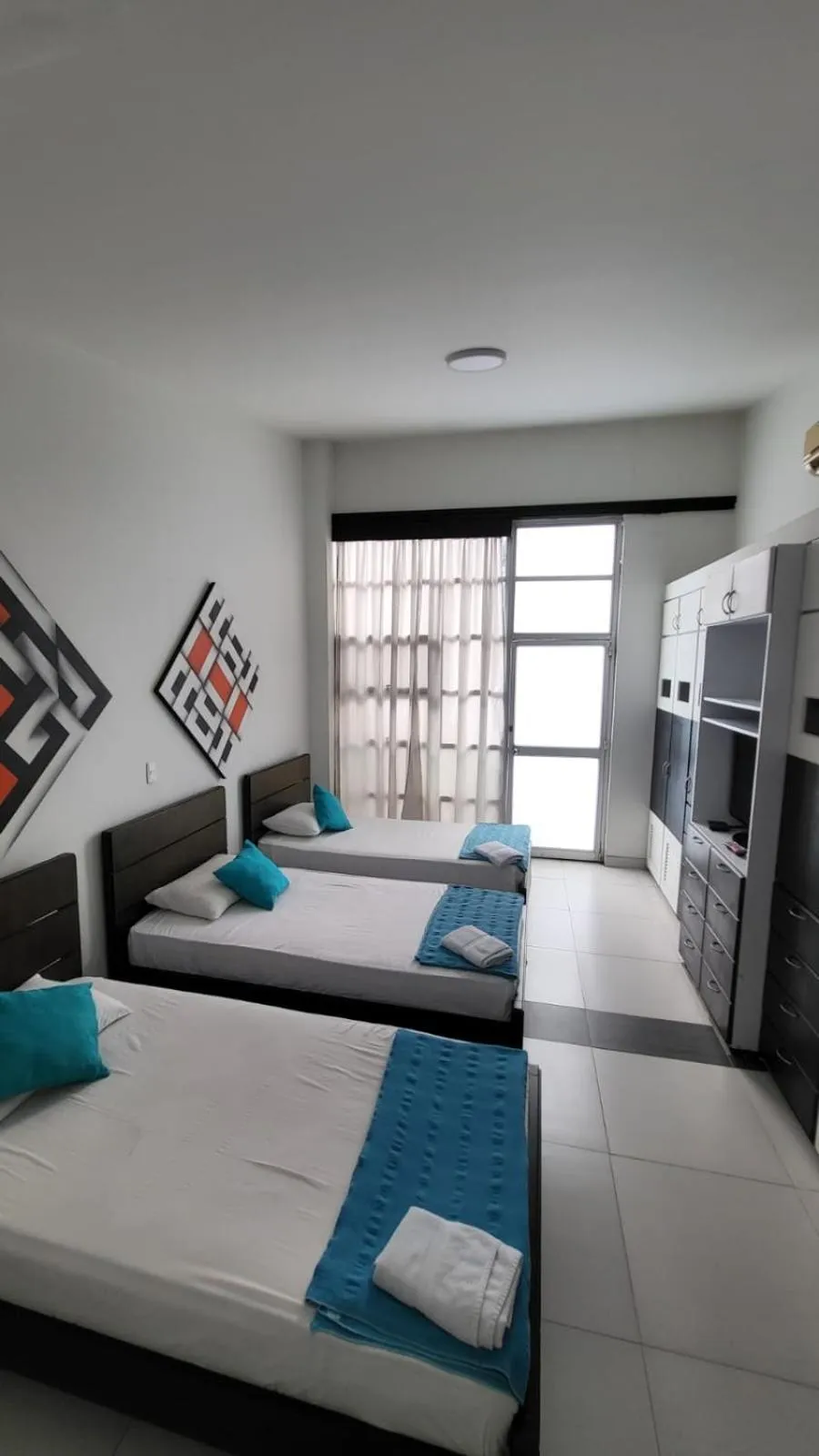 Kitchen or kitchenette, Bed in Hotel Torre del Viento cali