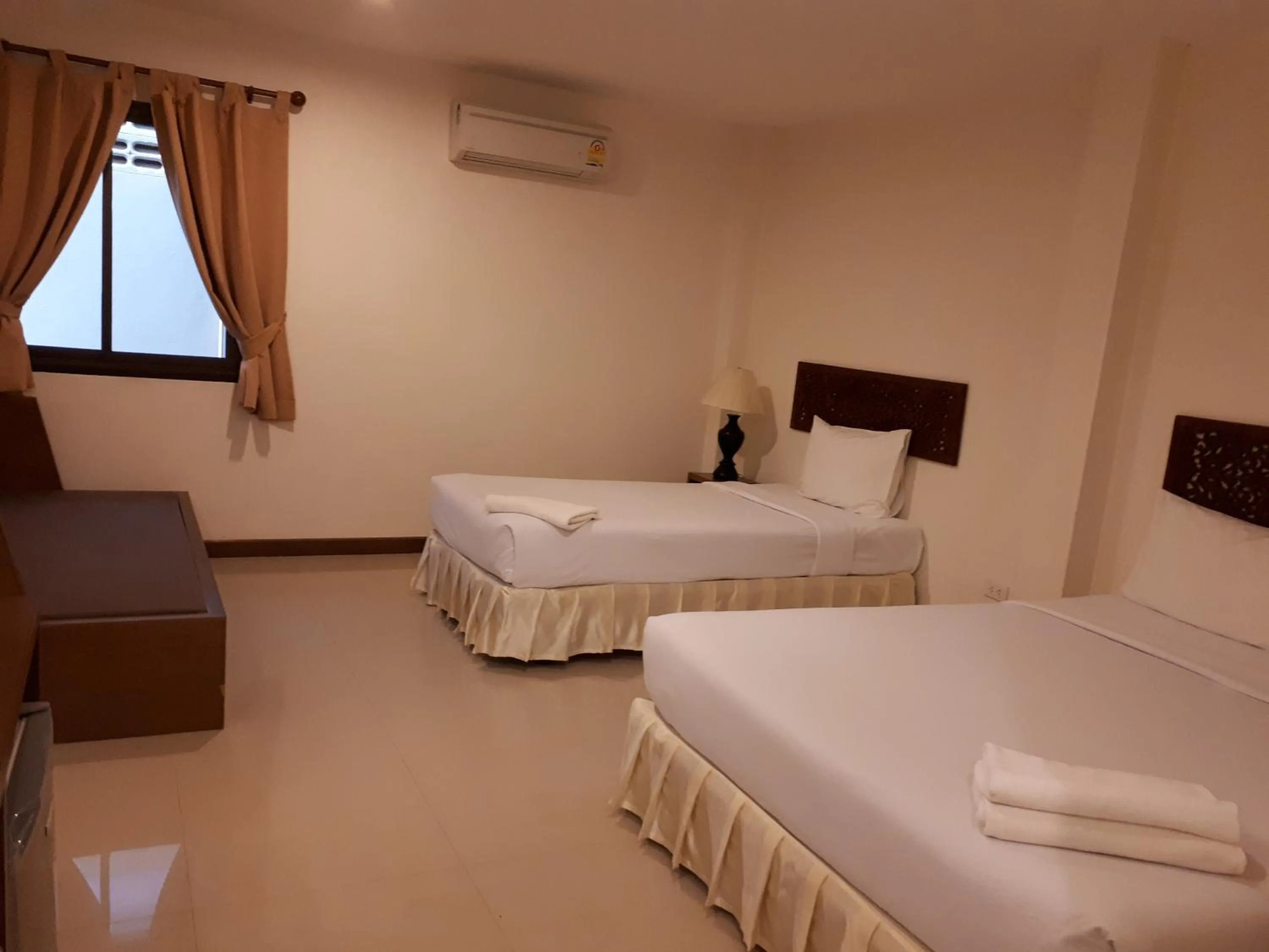 Bed in Nathon Residence Hotelโรงเเรมหน้าทอนเรสซิเด้นท์